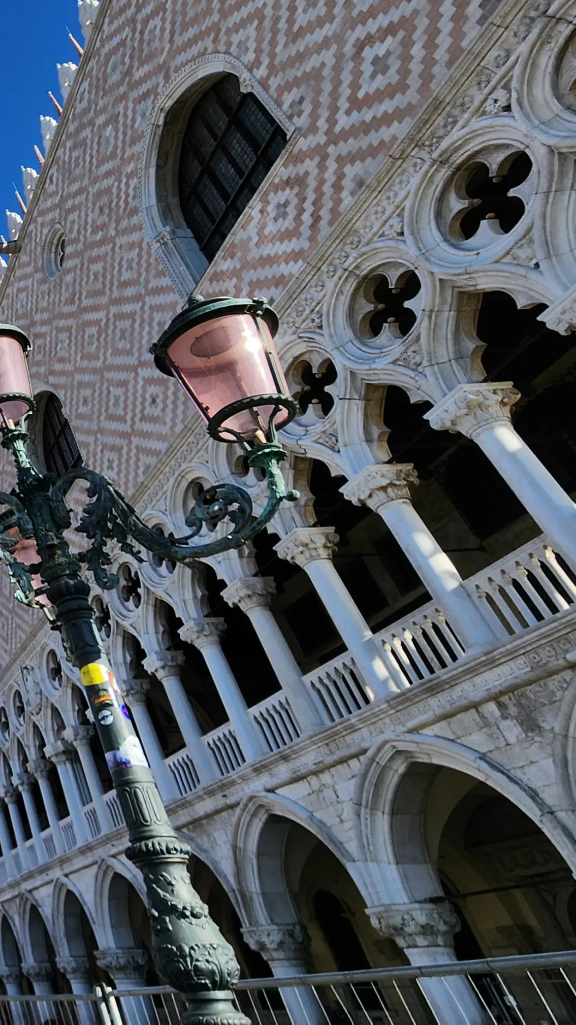 Pink and white façade of the Doge’s Palace, Venice