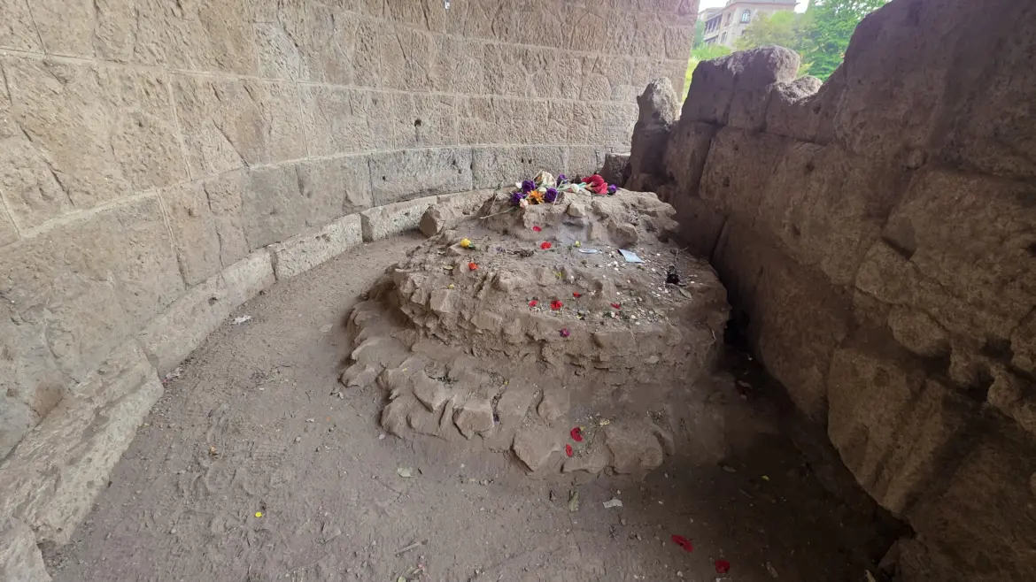 Flowers on the remains of the altar of Caesar in the Roman Forum, Rome, Italy