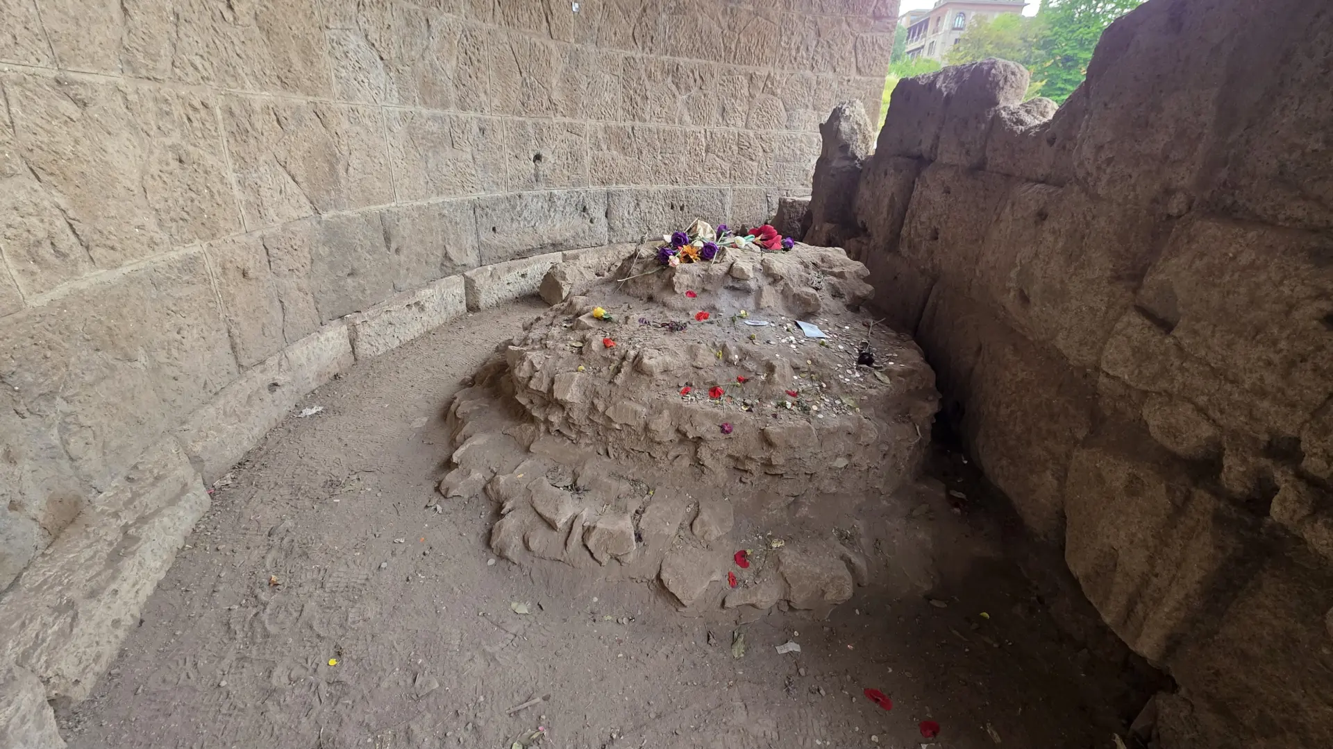 Flowers on the remains of the altar of Caesar in the Roman Forum, Rome, Italy