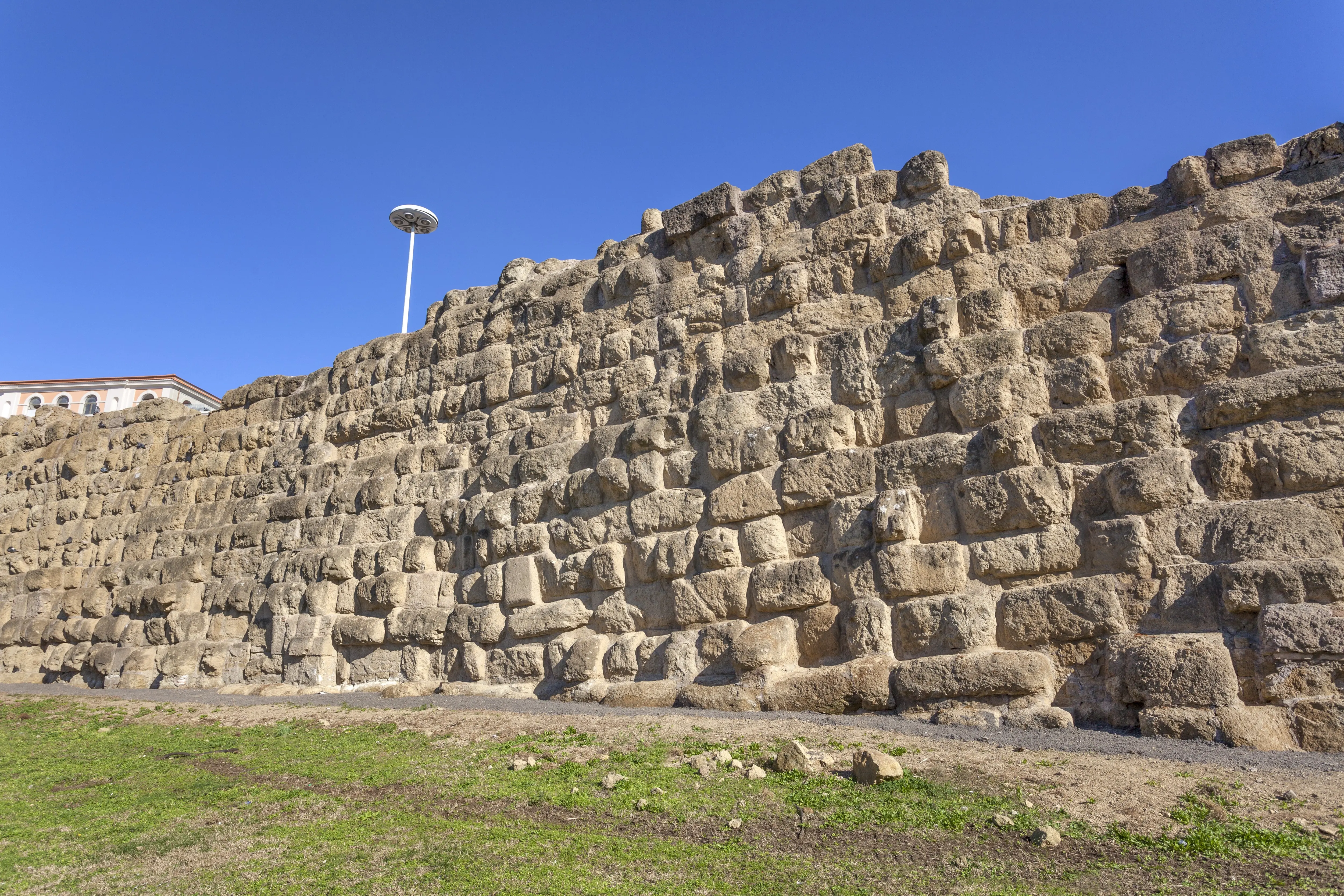 A preserved section of Servian Wall next to Termini Railway Station, Rome, Italy