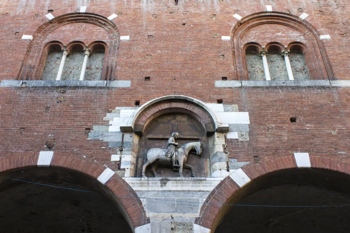Palazzo della Ragione’s red brick arches, Piazza Mercanti, Milan, Italy