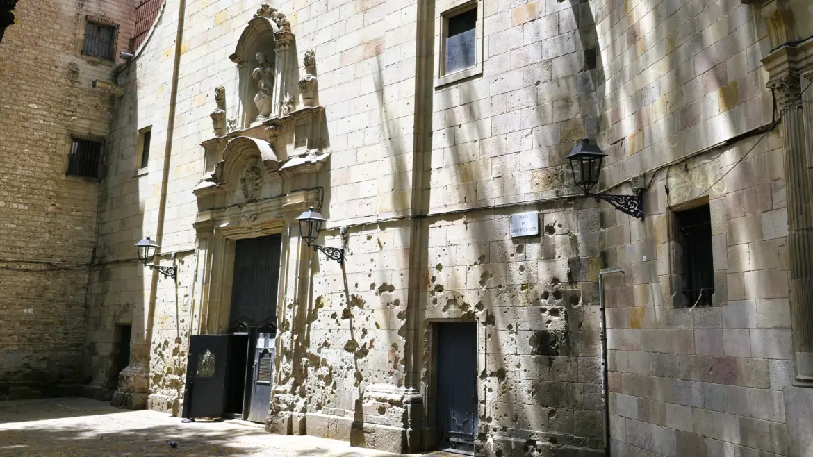 Marks of shrapnel and impact on the façade of the Church of Sant Felip Neri, Barcelona, Spain