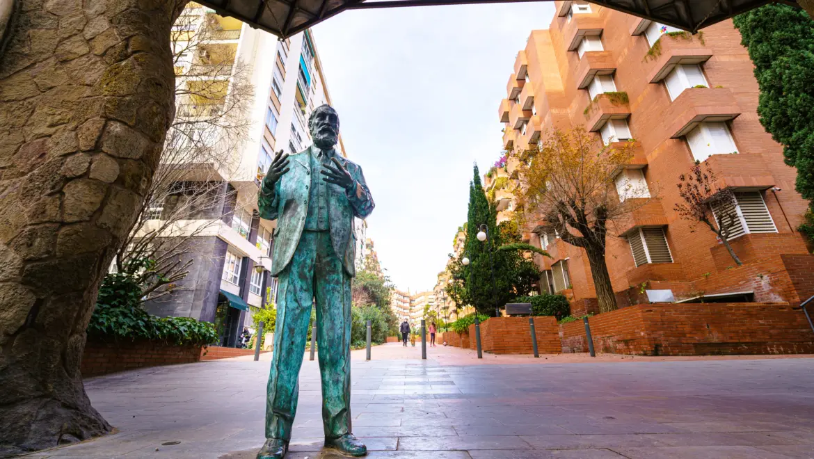 Statue of Antoni Gaudí at The Miralles Gate (or Finca Miralles Gate), Barcelona, Spain
