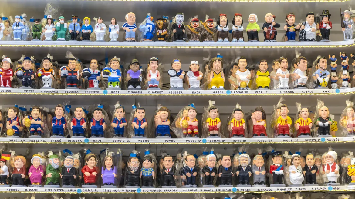 Caganer figures, Fira de Santa Llúcia, Plaça de la Seu, Barcelona, Spain