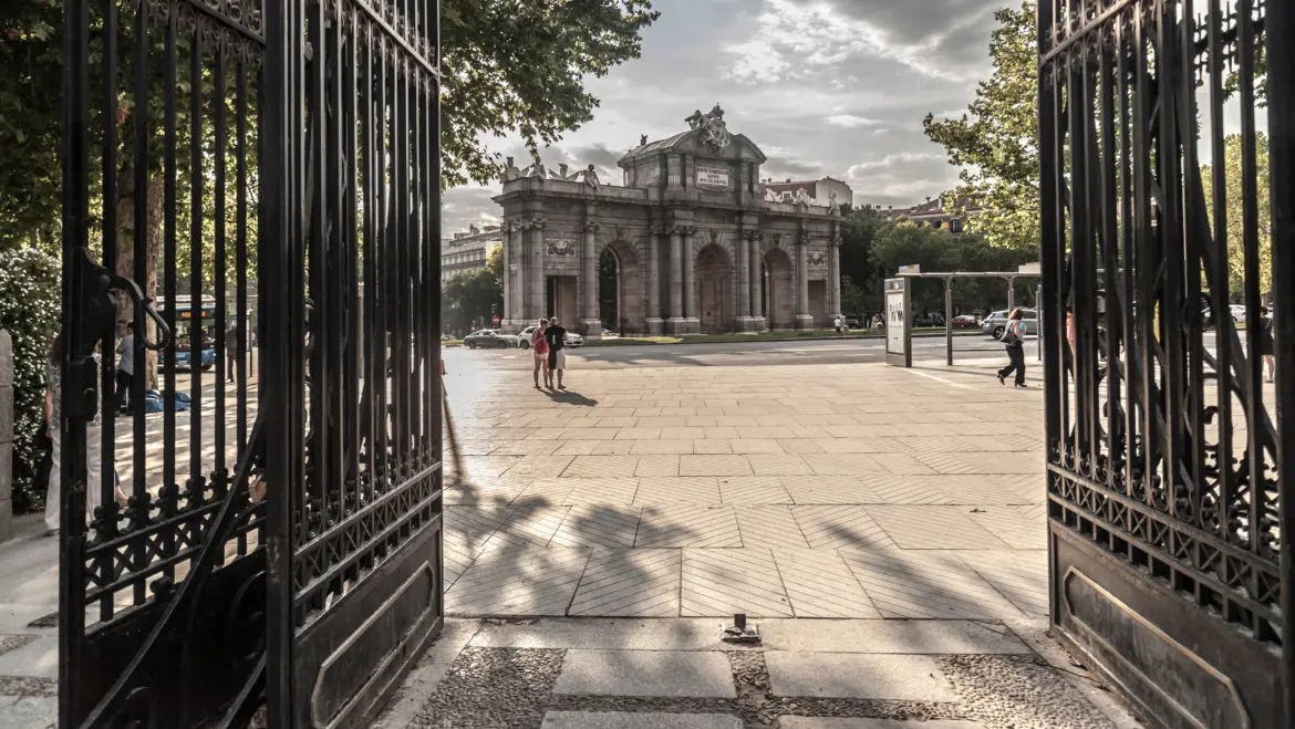 View of Puerta de Alcalá from the gates of El Retiro Park, Madrid, Spain