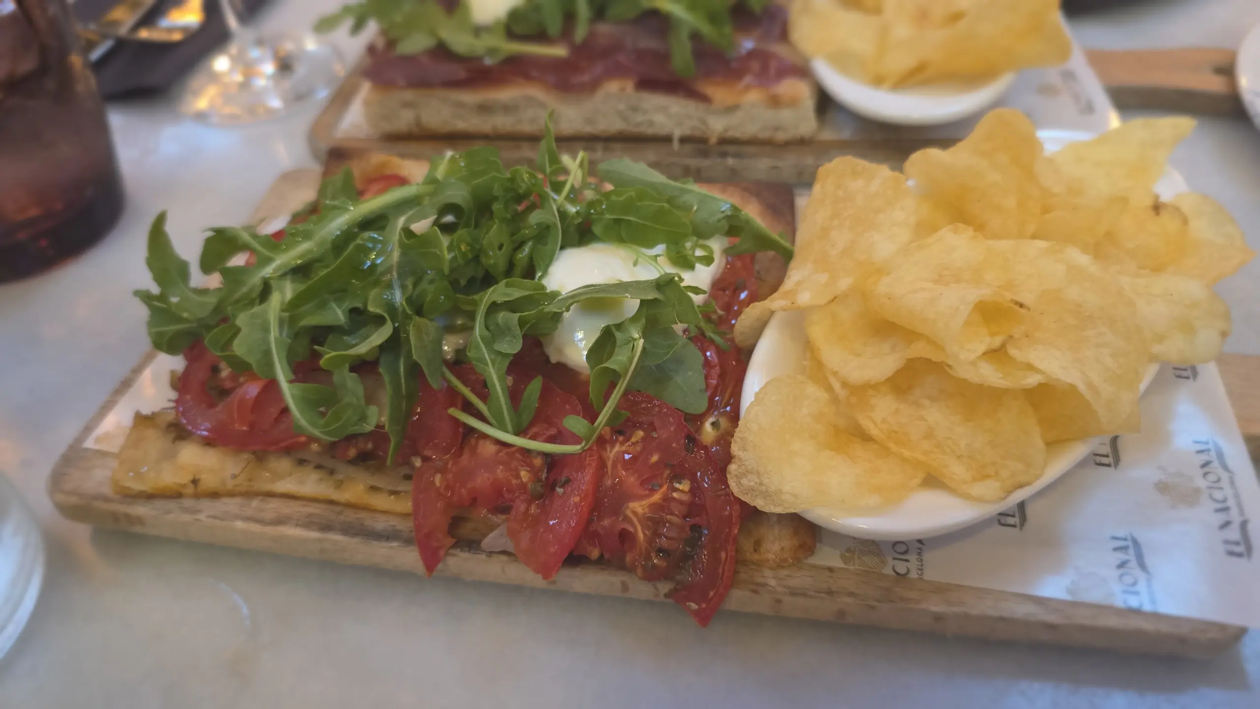 Flat bread with fresh tomato, onion confit and mozzarella, La Parada, El Nacional, Barcelona, Spain