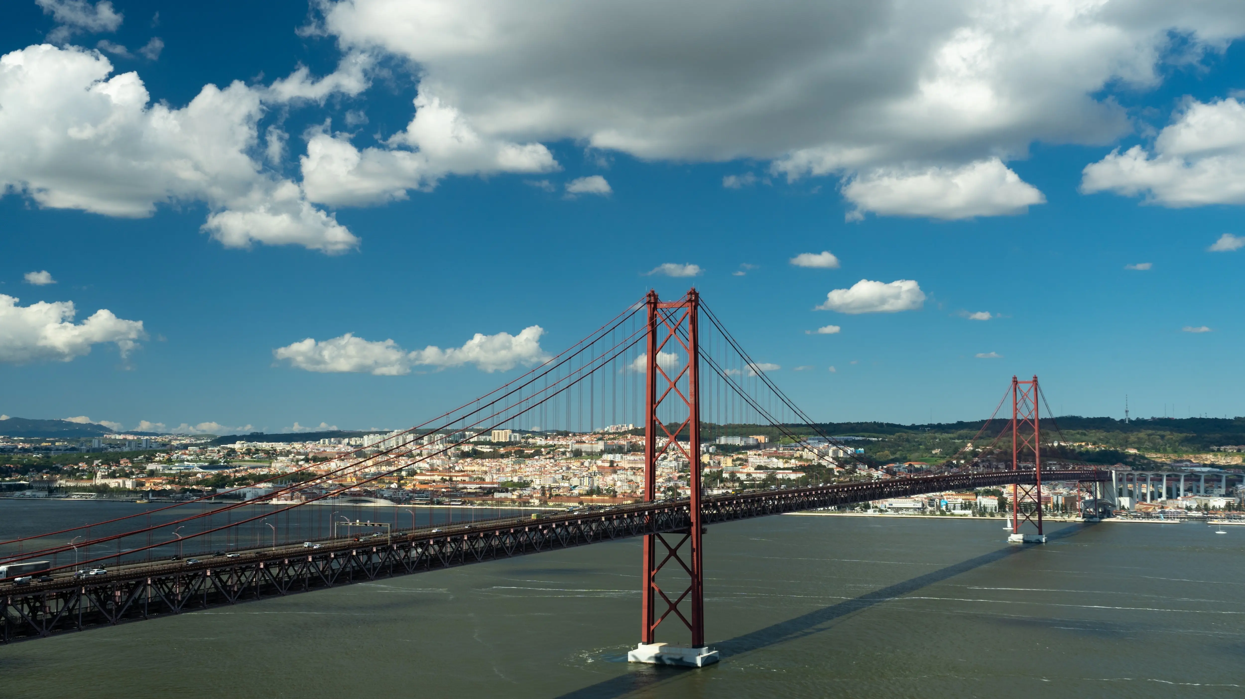 View of the 25 de Abril Bridge from the Sanctuary of Christ the King (Santuário de Cristo Rei), Lisbon, Portugal
