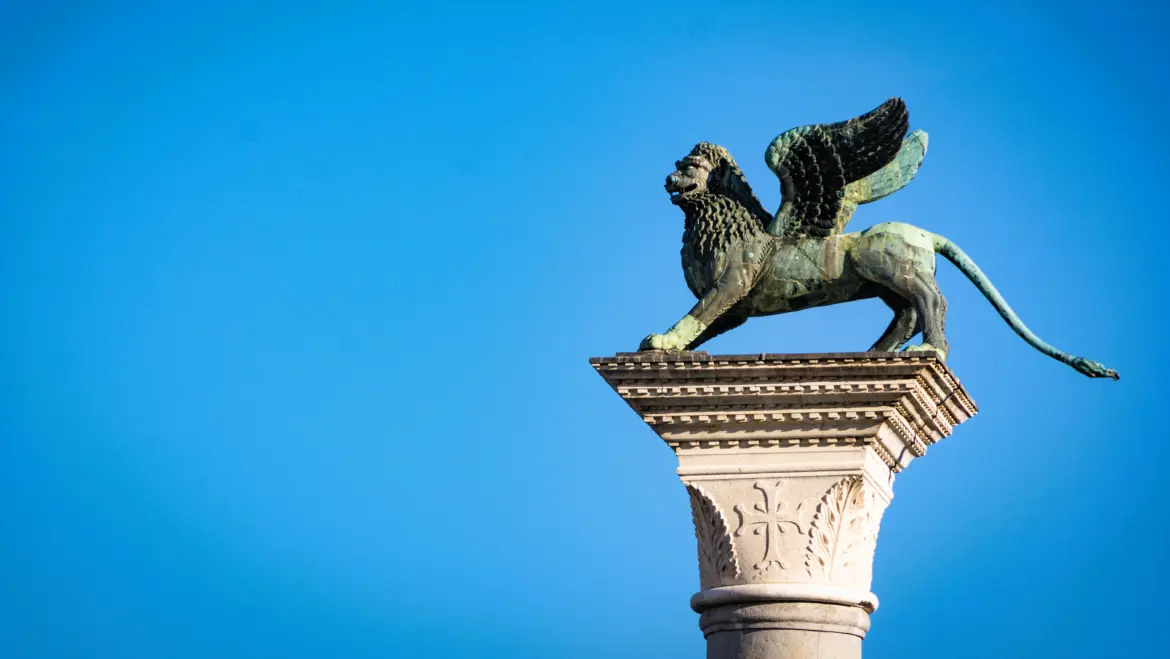Ancient bronze sculpture winged lion Piazzetta San Marco symbolizing Venice patron saint Saint Mark