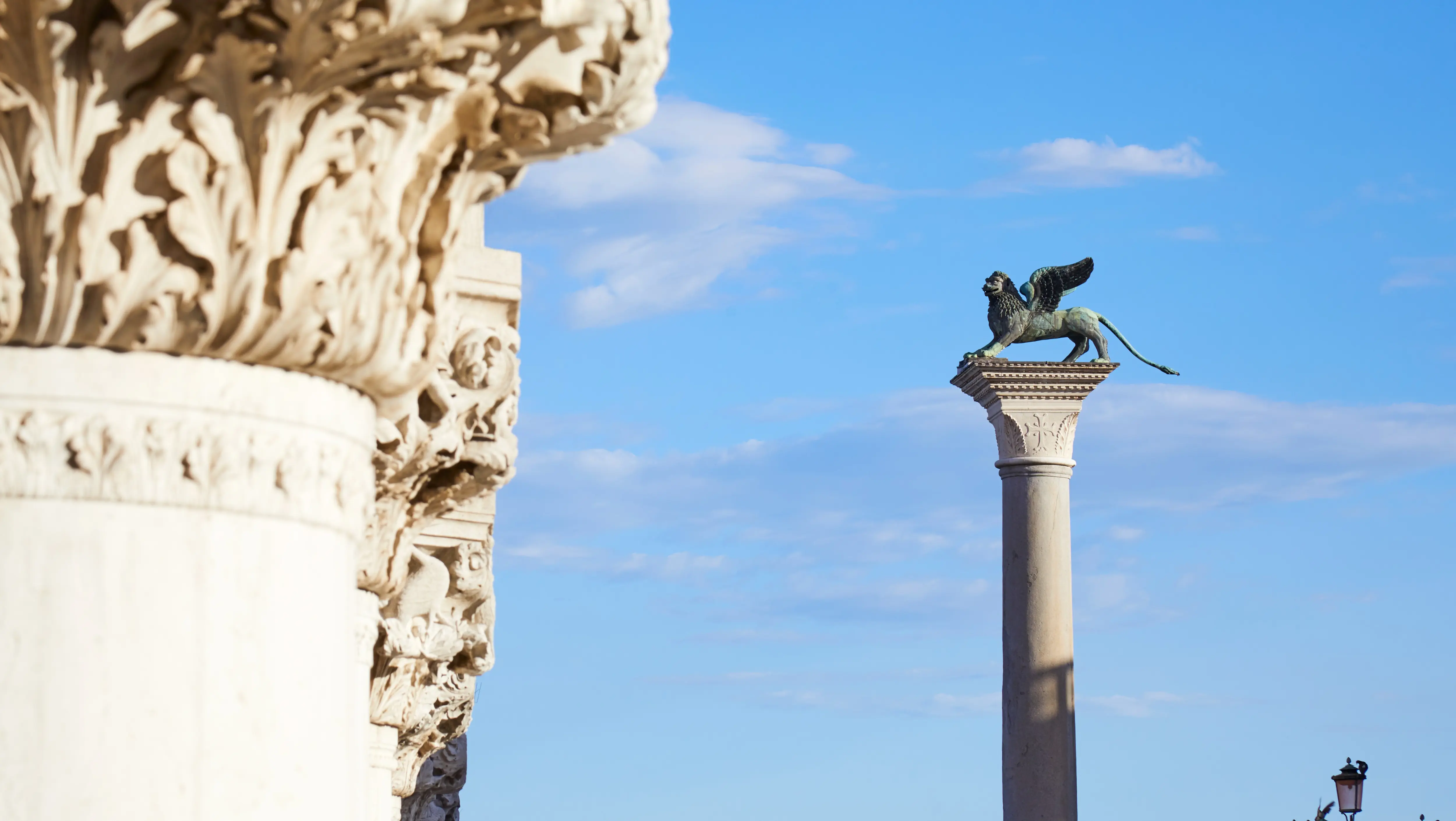 Column of St. Mark crowned with Winged Lion of Saint Mark Piazzetta San Marco Venice historic symbol Venetian Republic power maritime legacy