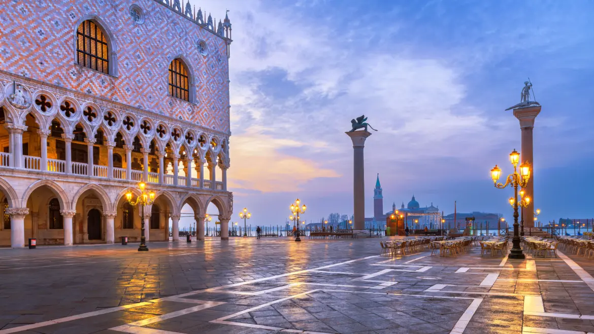 View Doge's Palace and Columns St Mark St Theodore Piazzetta San Marco Venice Italy