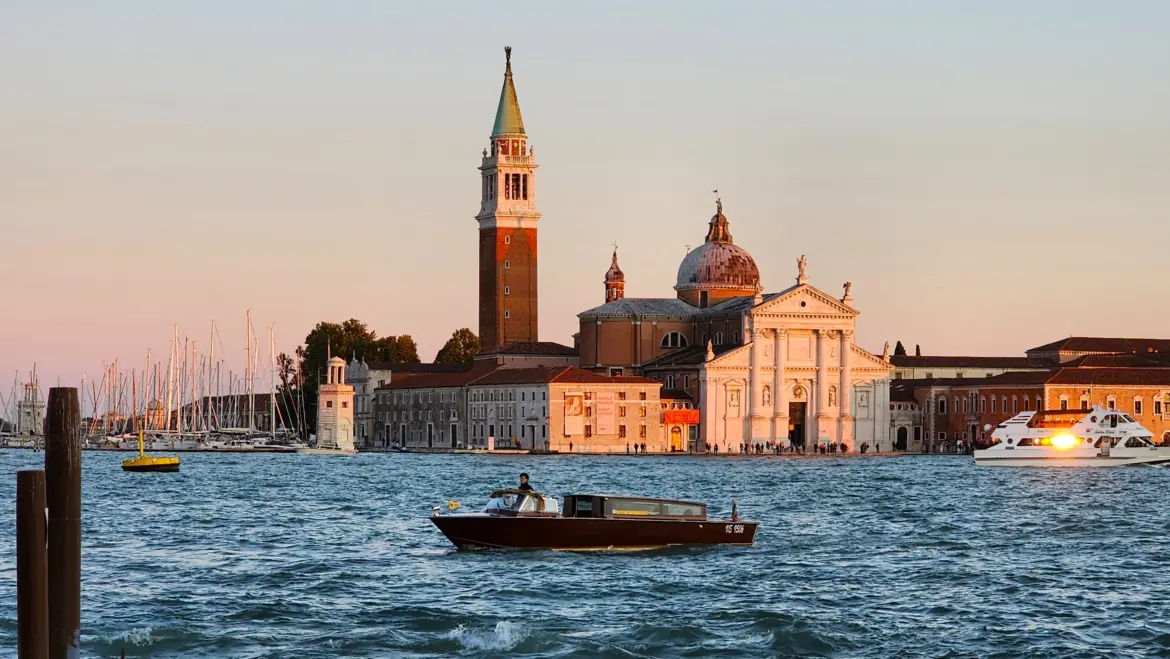 View Basilica San Giorgio Maggiore on island across Venetian Lagoon seen from Piazza San Marco Venice Italy