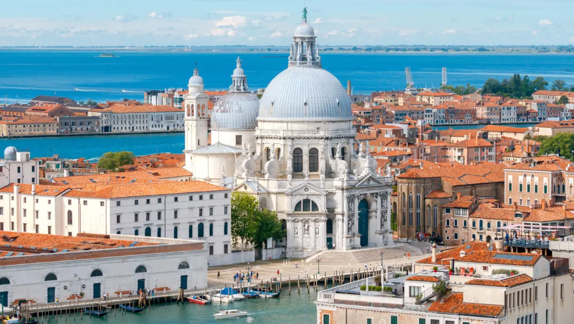 Basilica Santa Maria della Salute rising along Grand Canal Dorsoduro from St Mark's Campanile Venice Italy