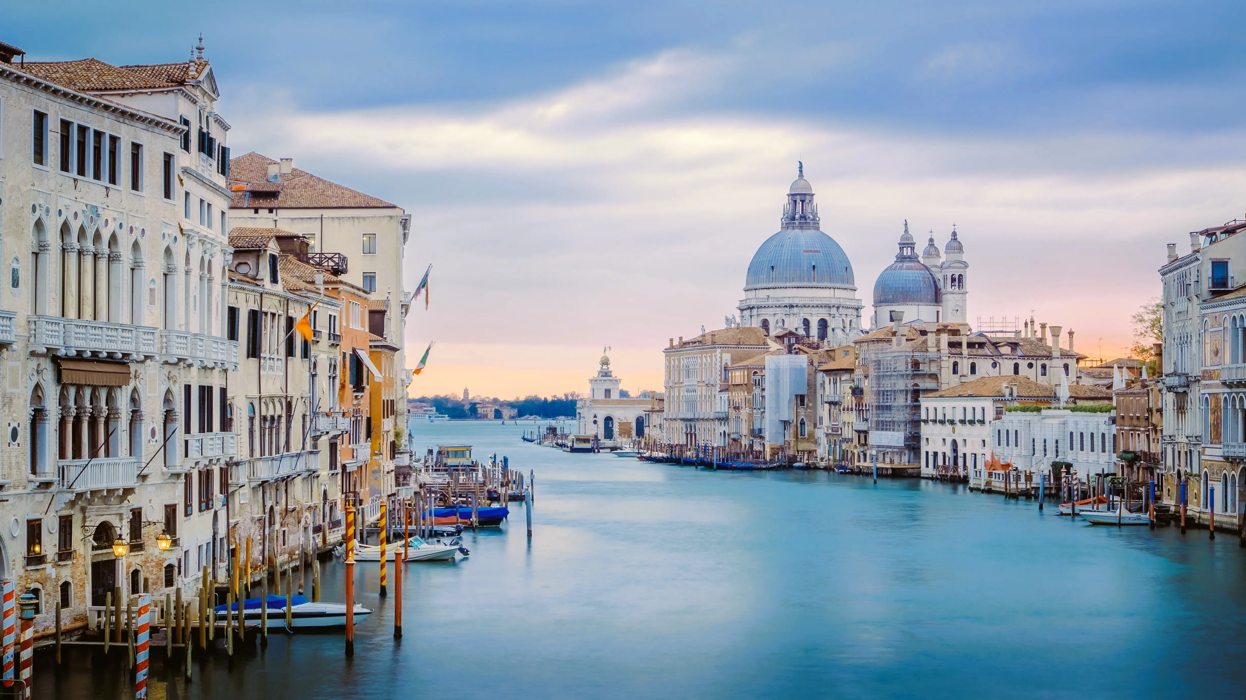 View of domes Santa Maria della Salute basilica from Ponte dell'Accademia Accademia Bridge Grand Canal Venice Italy