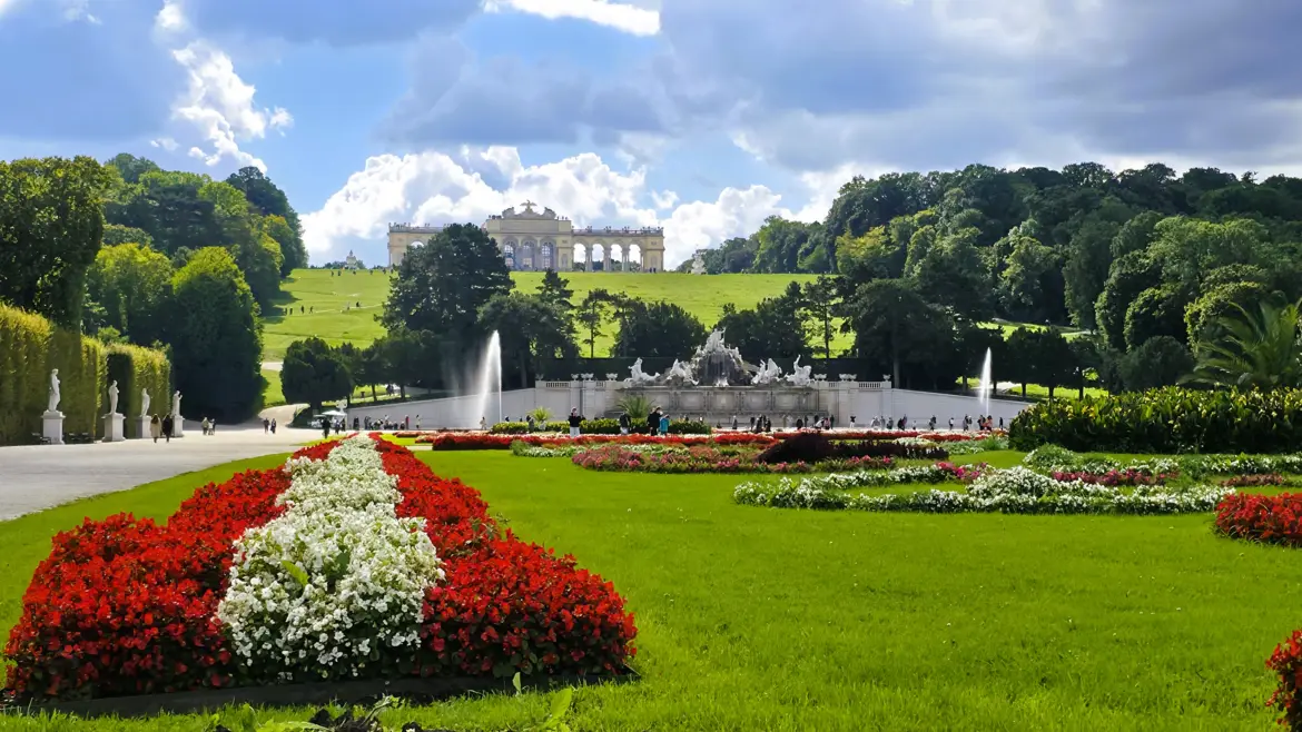 Autumn view Schönbrunn Palace Gardens Vienna Austria Neptune Fountain Gloriette framed soft October light imperial elegance symmetry harmony
