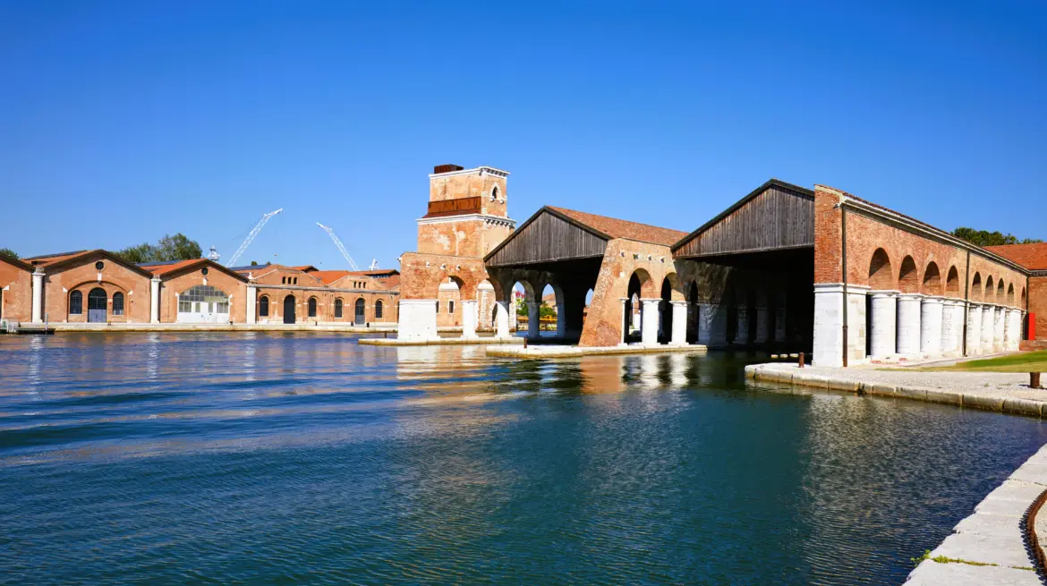 Historic docks and arcaded structures Venetian Arsenal Venice Italy used exhibition spaces during Venice Biennale