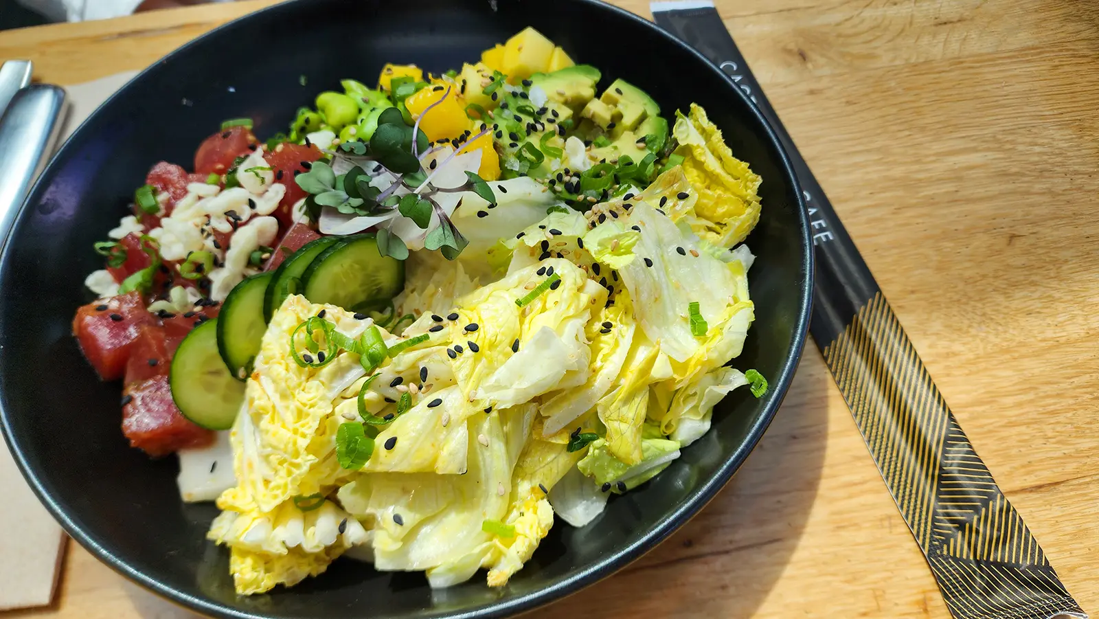 Tuna Poke Bowl at Cactus Club Cafe Coal Harbour with sesame ginger ahi tuna, mango, avocado, and jasmine rice