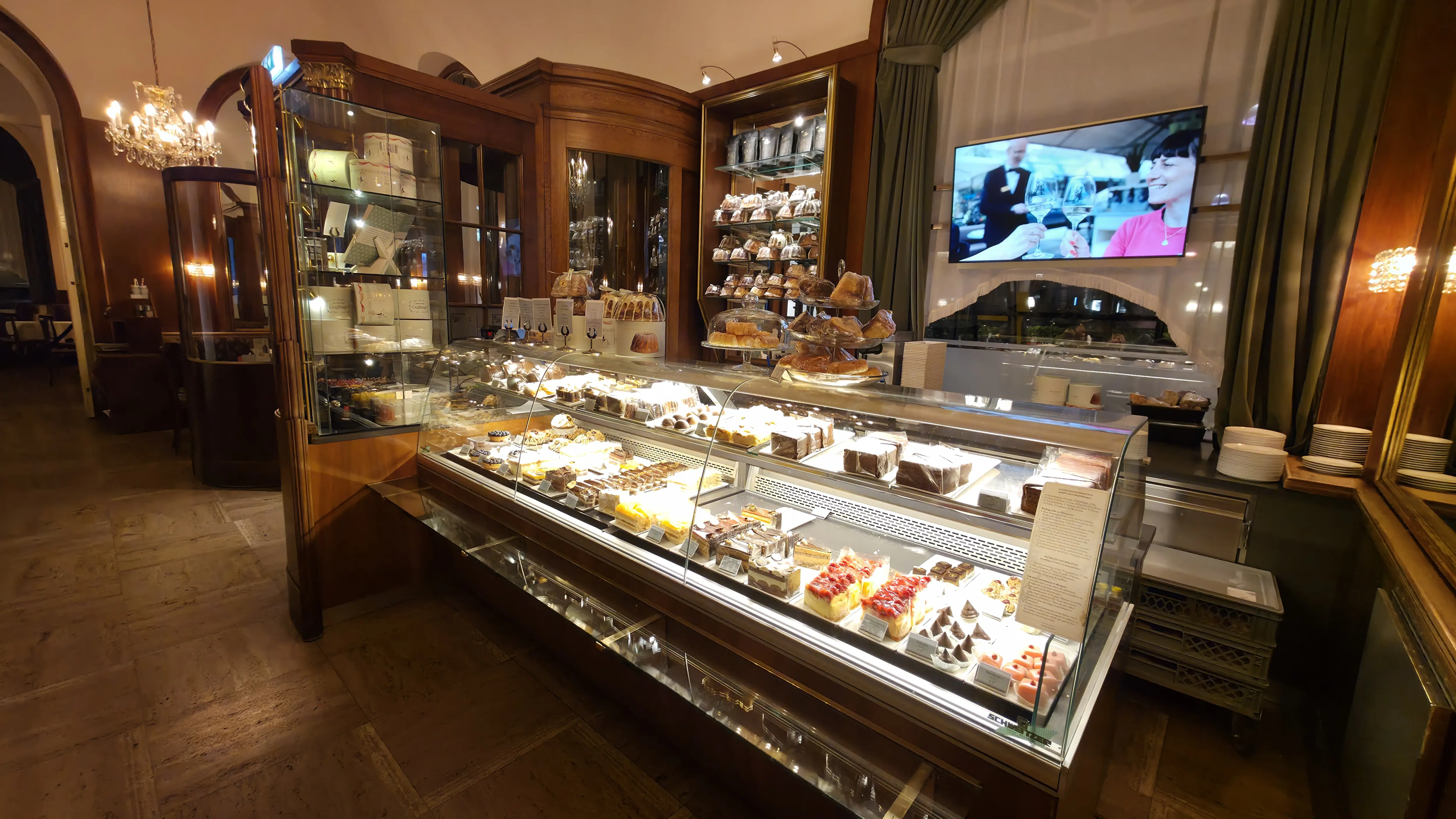 The dessert display inside Café Landtmann in Vienna showcasing classic Viennese tortes and pastries