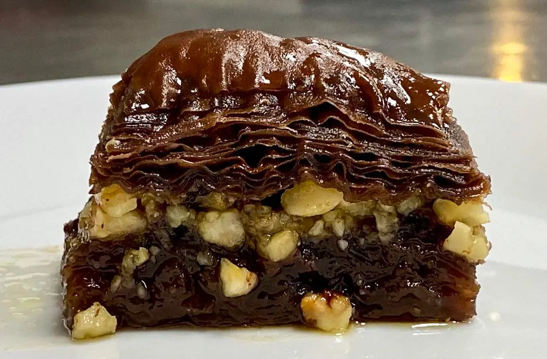 Chocolate Baklava Golden Horn Turkish Bakery Vancouver Chocolate baklava close-up from The Golden Horn Turkish Bakery and Cafe at Canada Place Vancouver showing layers of cocoa-infused yufka dough hazelnuts and chocolate chips