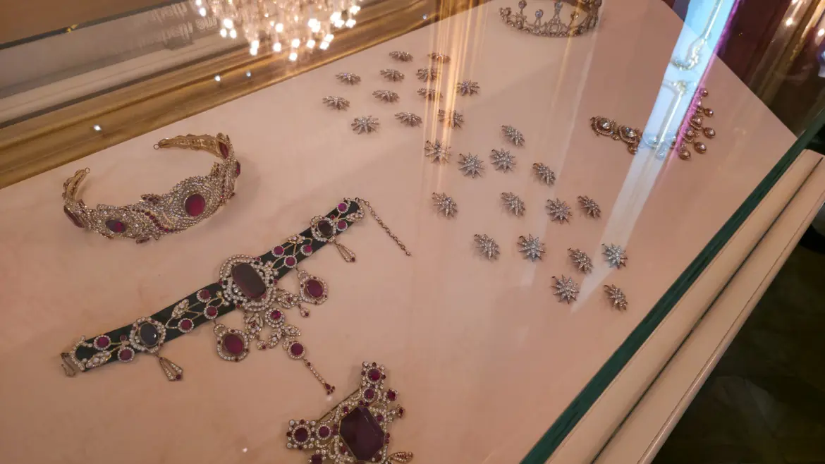 Jewelry of Empress Elisabeth (Sisi) on display at the Sisi Museum, including necklaces, brooches, and a tiara
