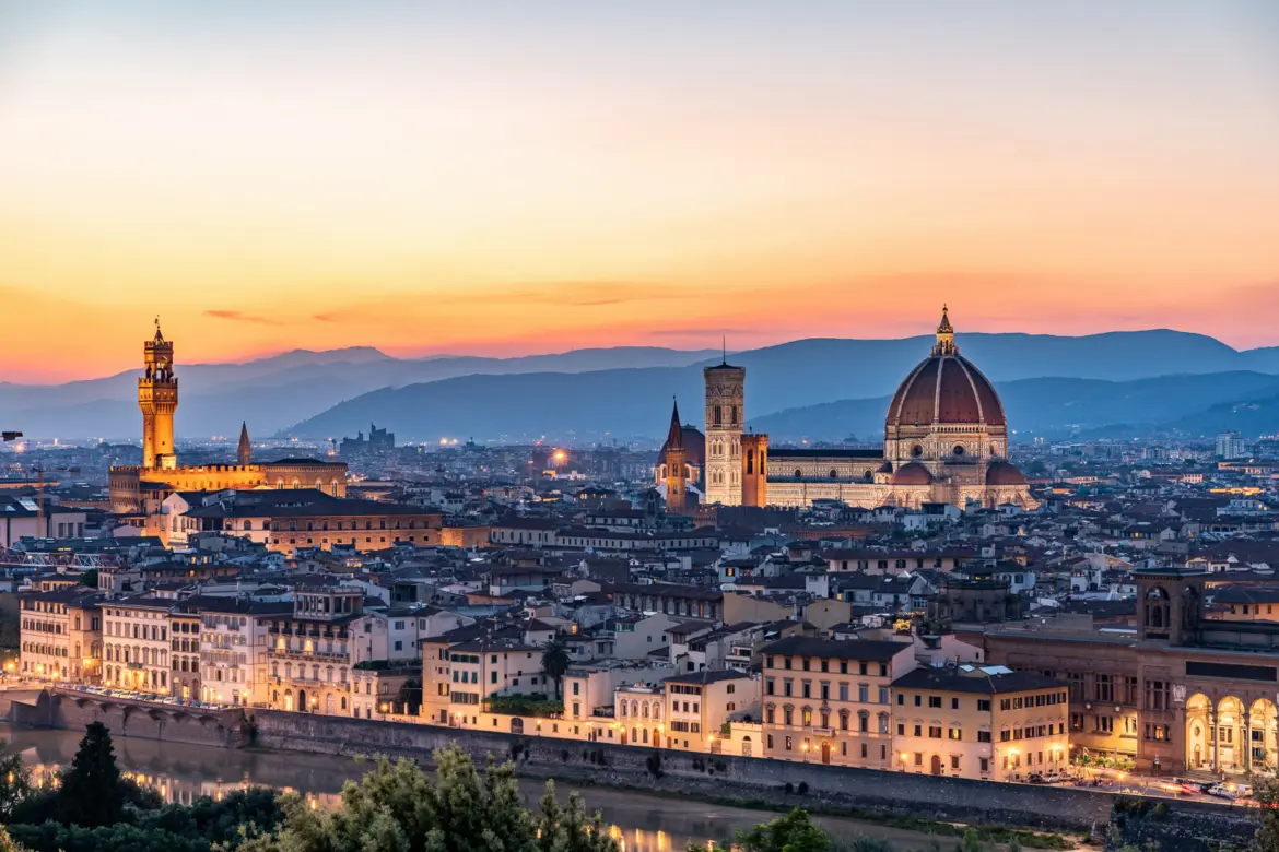 Evening view of Florence from Piazzale Michelangelo, featuring the Duomo and historic city skyline