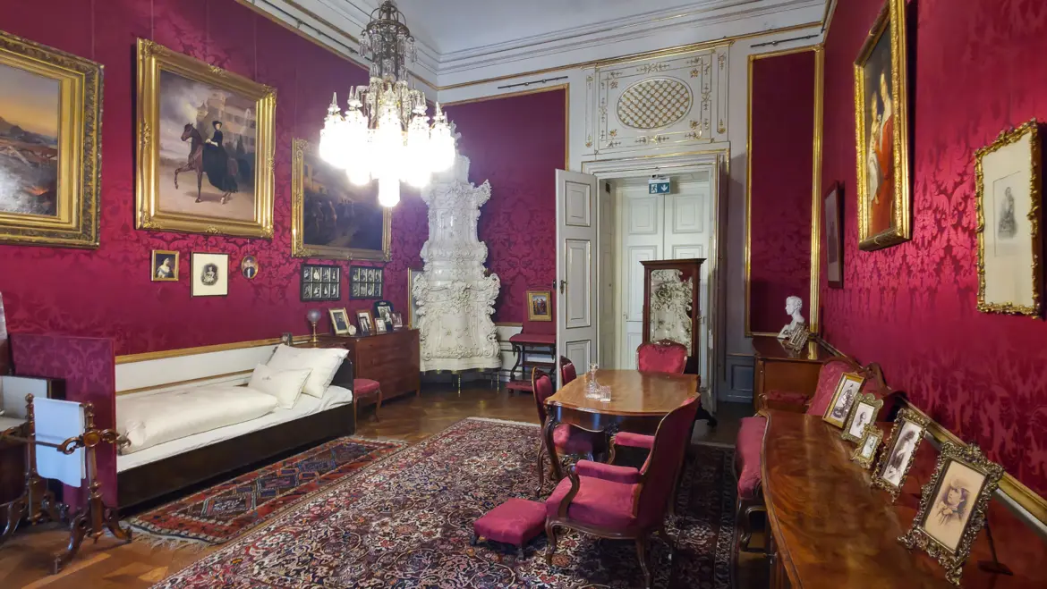 Emperor Franz Joseph I’s bedroom in the Imperial Apartments featuring his simple iron bedstead