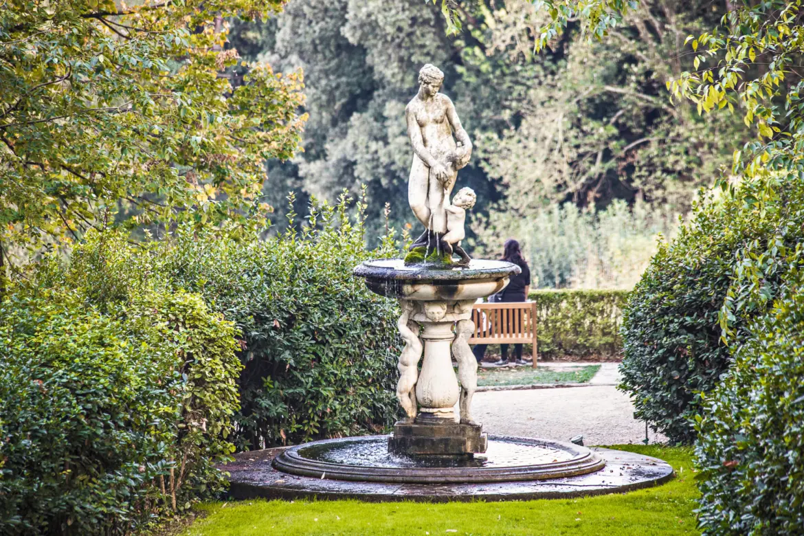 Classical Renaissance fountain and sculpture detail among the peaceful pathways of Giardino Bardini in Florence