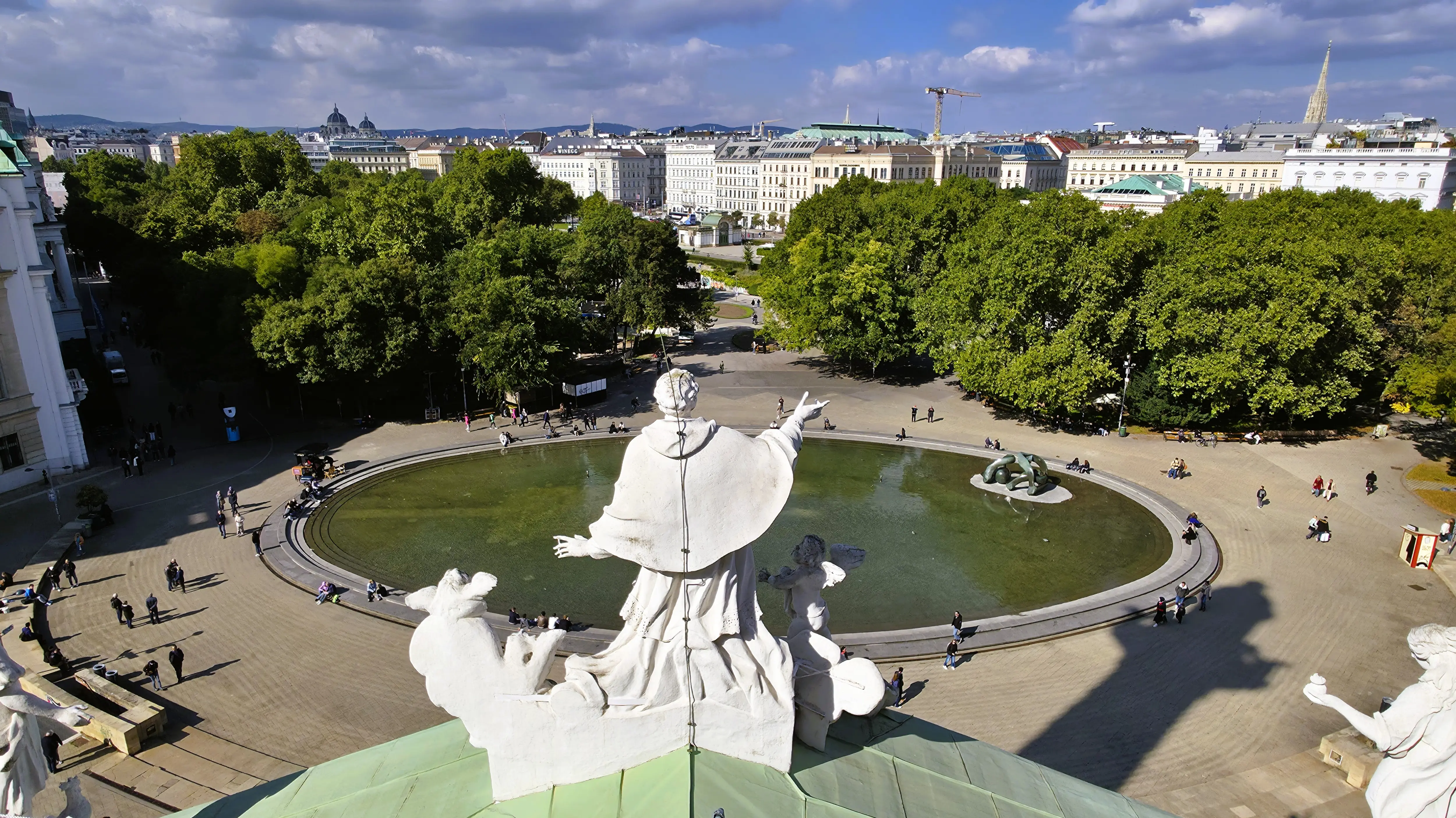 Panoramic view over Karlsplatz and the reflecting pool from the rooftop of Karlskirche in Vienna, Austria