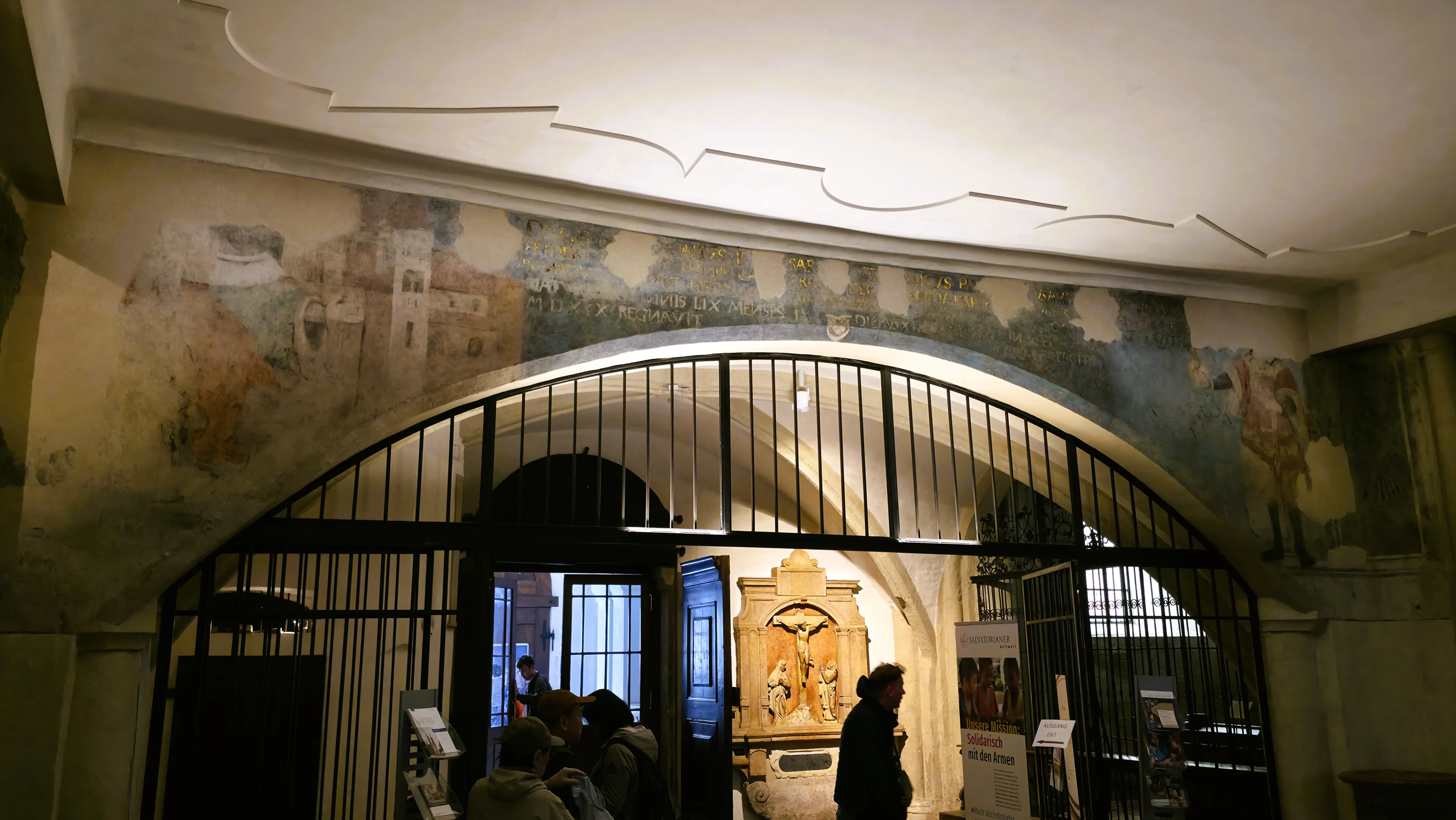 Medieval paintings and historic inscriptions near the inner entrance of St. Michael’s Church in Vienna