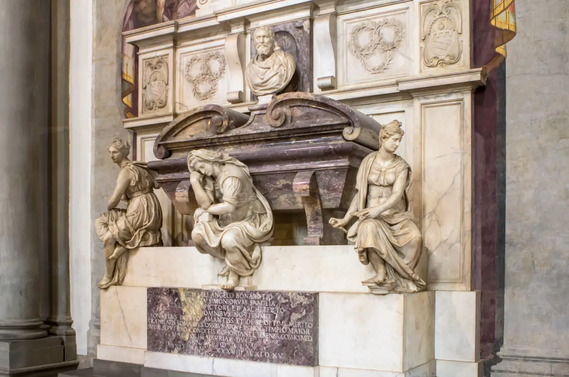 Tomb of Michelangelo Buonarroti inside Santa Croce Basilica in Florence with allegorical figures of Painting Sculpture and Architecture in funerary marble