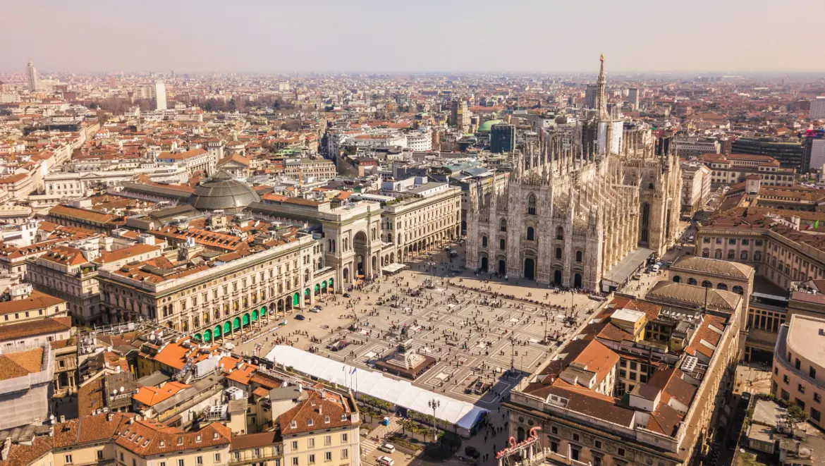 Aerial view of Milan, Italy, showcasing the Duomo di Milano, Galleria Vittorio Emanuele II, and Piazza del Duomo