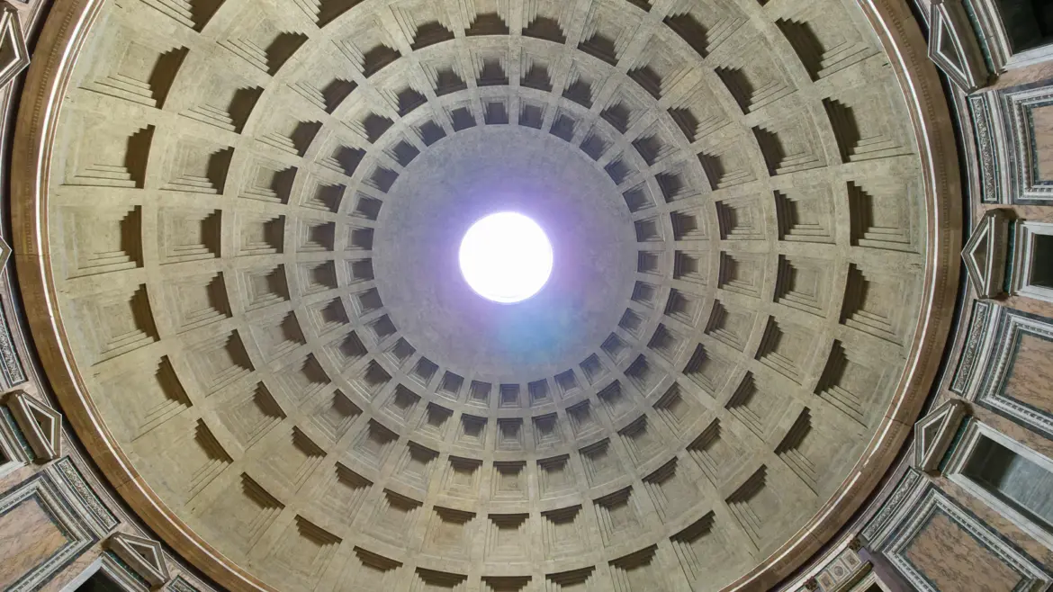 The Pantheon oculus in Rome with sunlight streaming through the circular opening in the coffered concrete dome