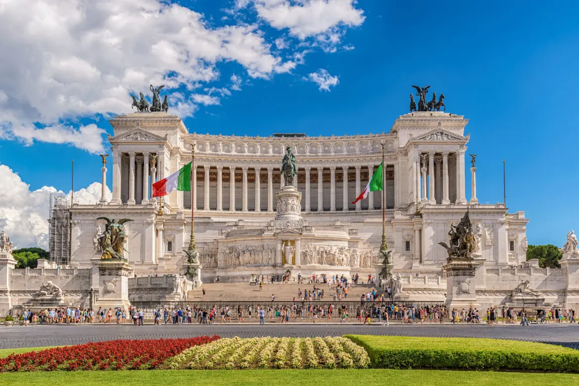 Piazza Venezia in Rome with the white marble Monument to Vittorio Emanuele II Vittoriano gleaming in the background