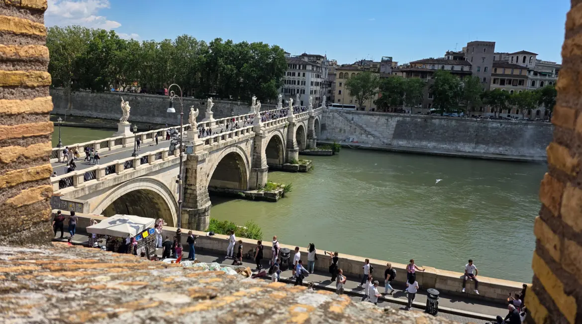View of Ponte Sant Angelo and the Tiber River from Castel Sant Angelo in Rome with Bernini angel statues along the bridge