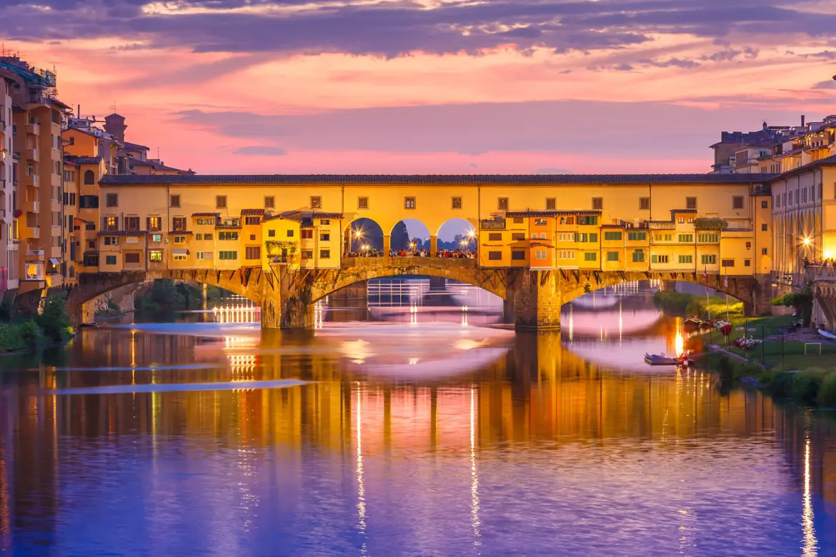 Ponte Vecchio at sunset over the Arno River in Florence