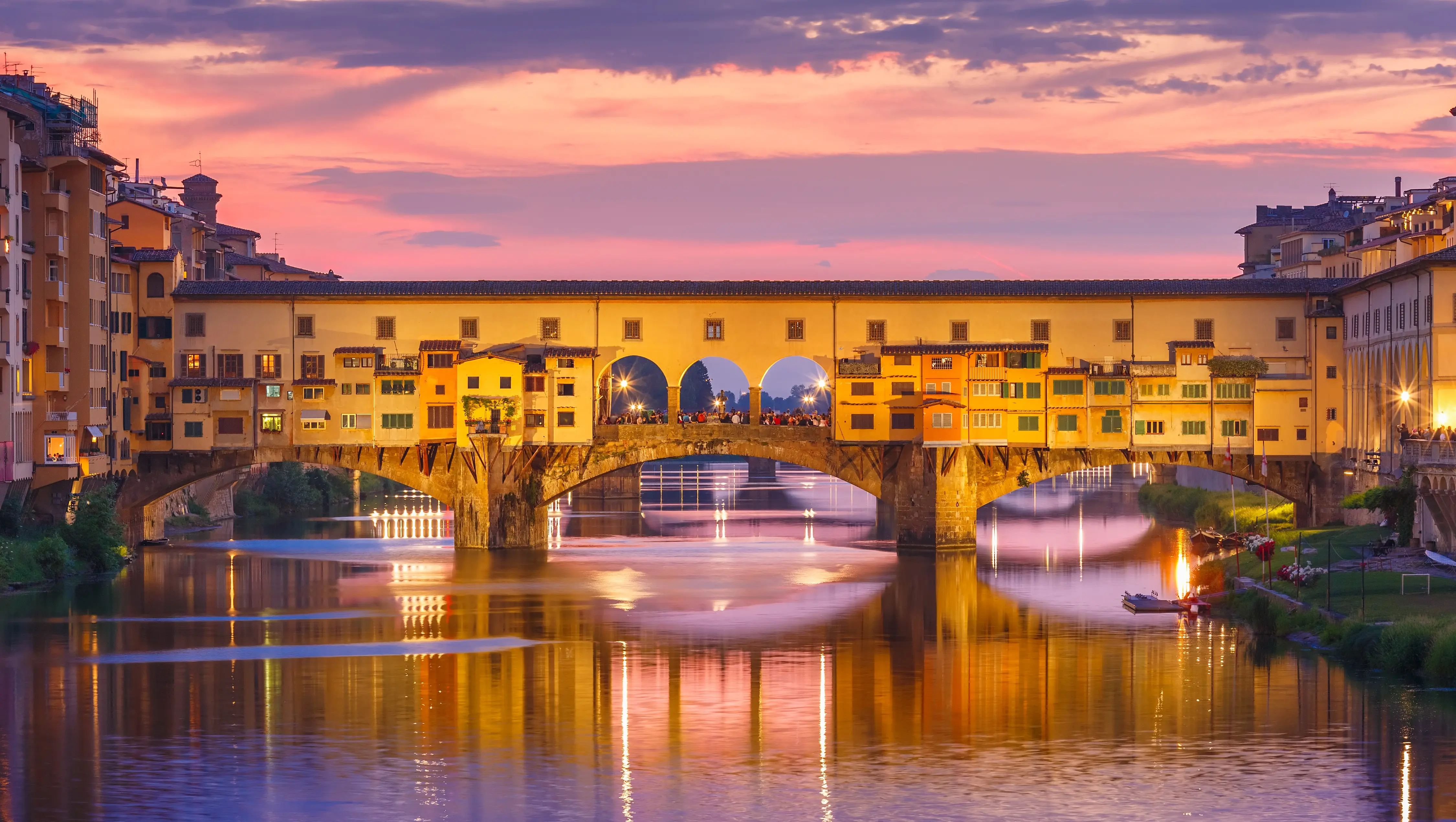 Ponte Vecchio at sunset over the Arno River in Florence