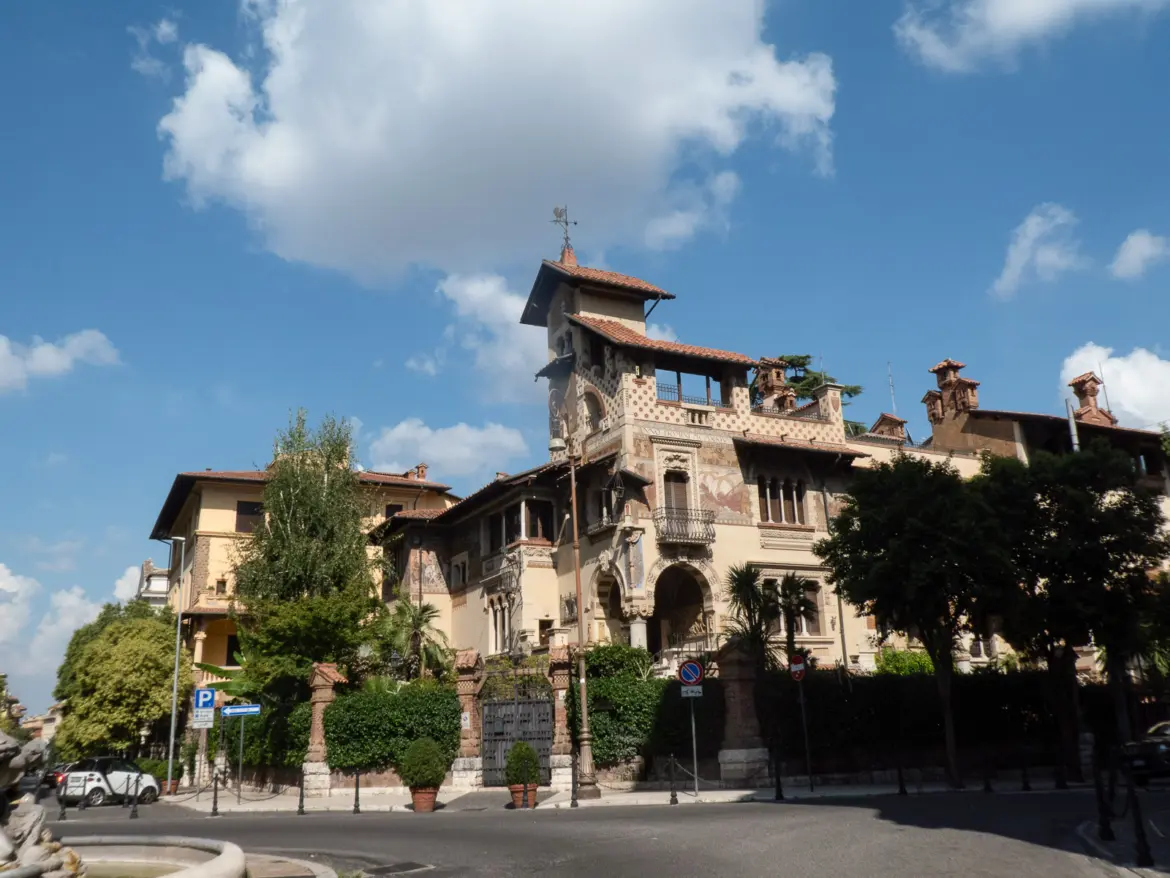 Art Nouveau and fairytale architecture of Quartiere Coppede in Rome with ornate towers turrets and eclectic decorative details