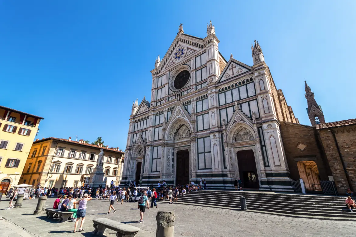 The marble façade of Santa Croce Basilica in Florence, resting place of Michelangelo and Galileo