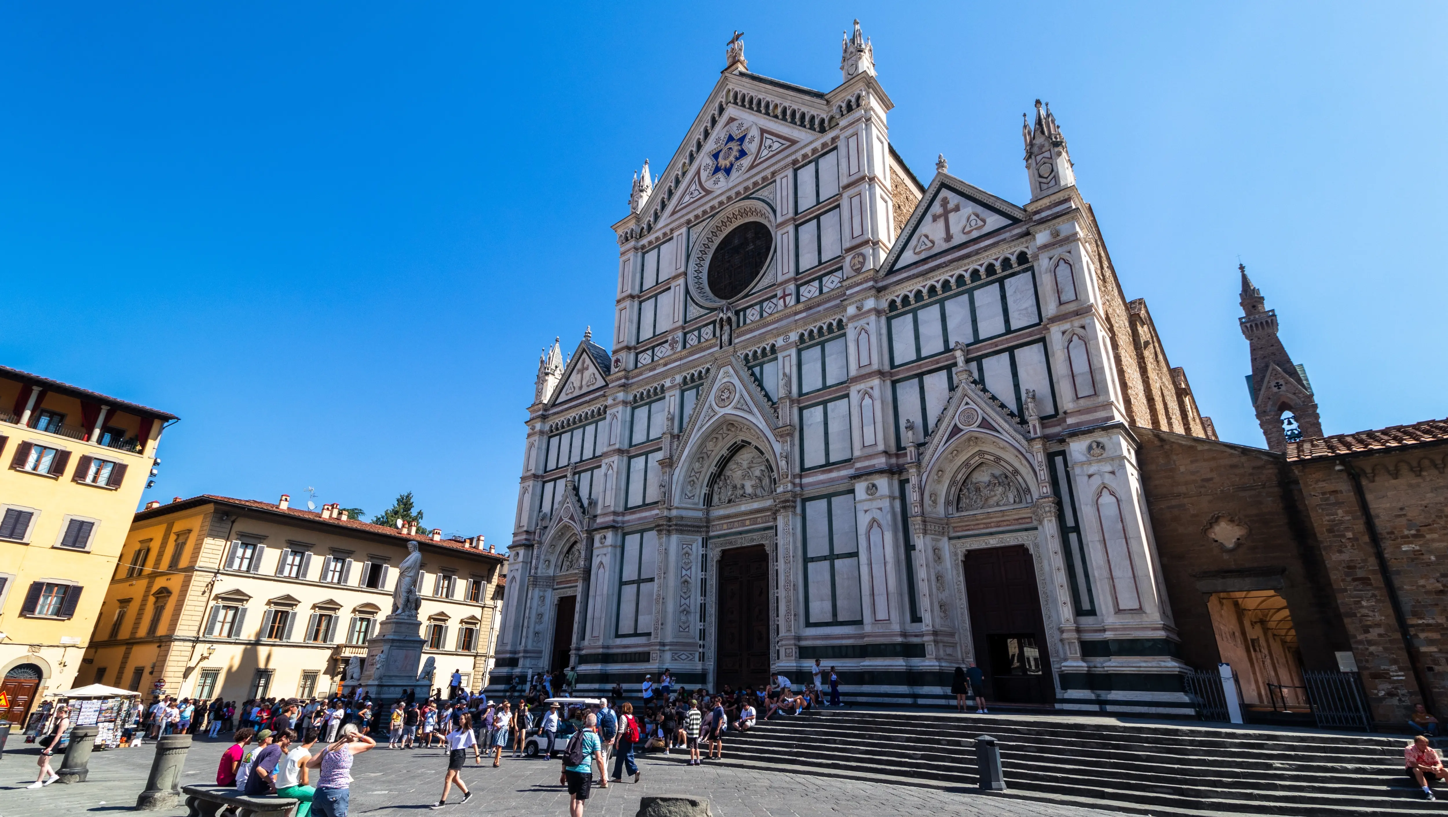 The marble façade of Santa Croce Basilica in Florence, resting place of Michelangelo and Galileo