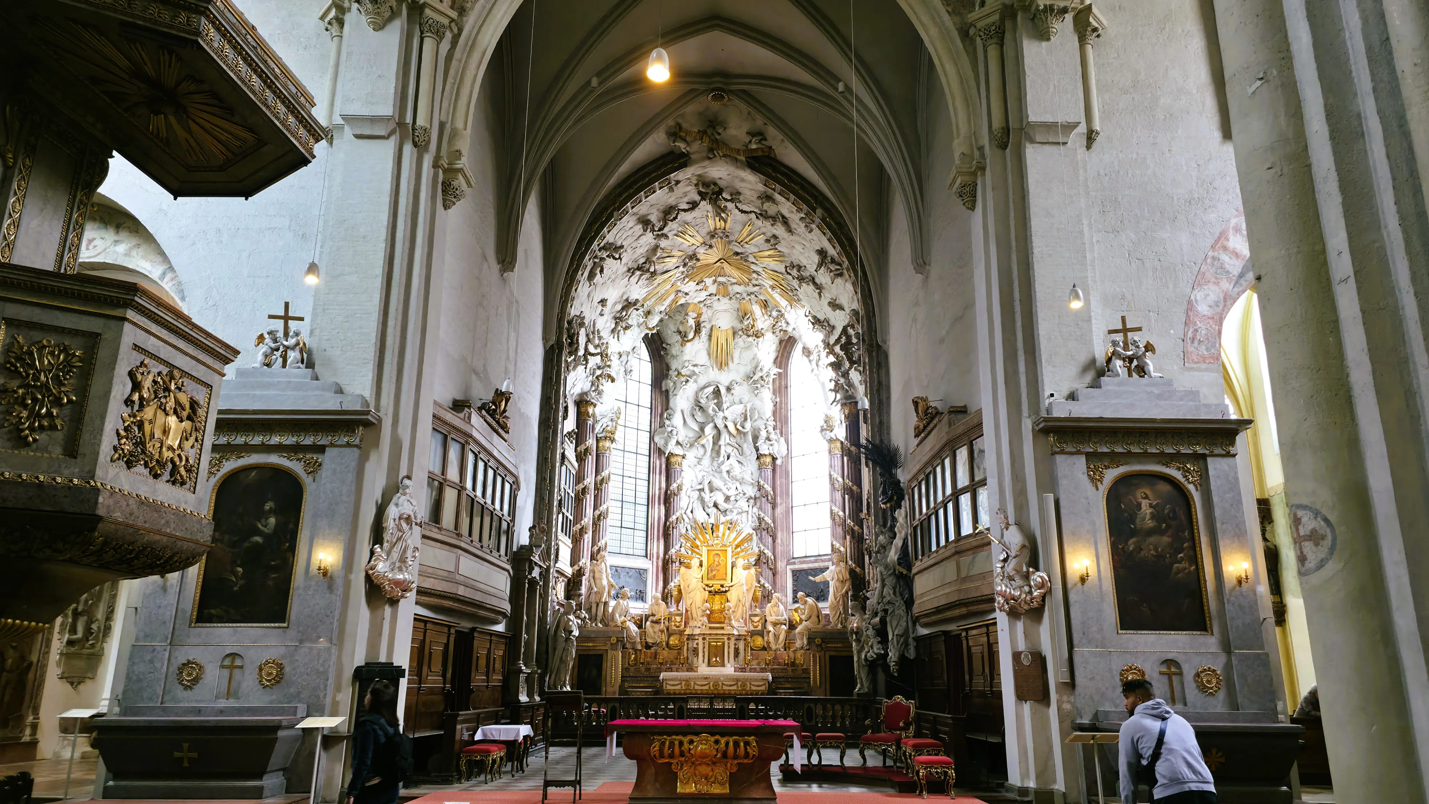 The high altar of St. Michael’s Church in Vienna featuring the Fall of the Angels and the Maria Candia icon