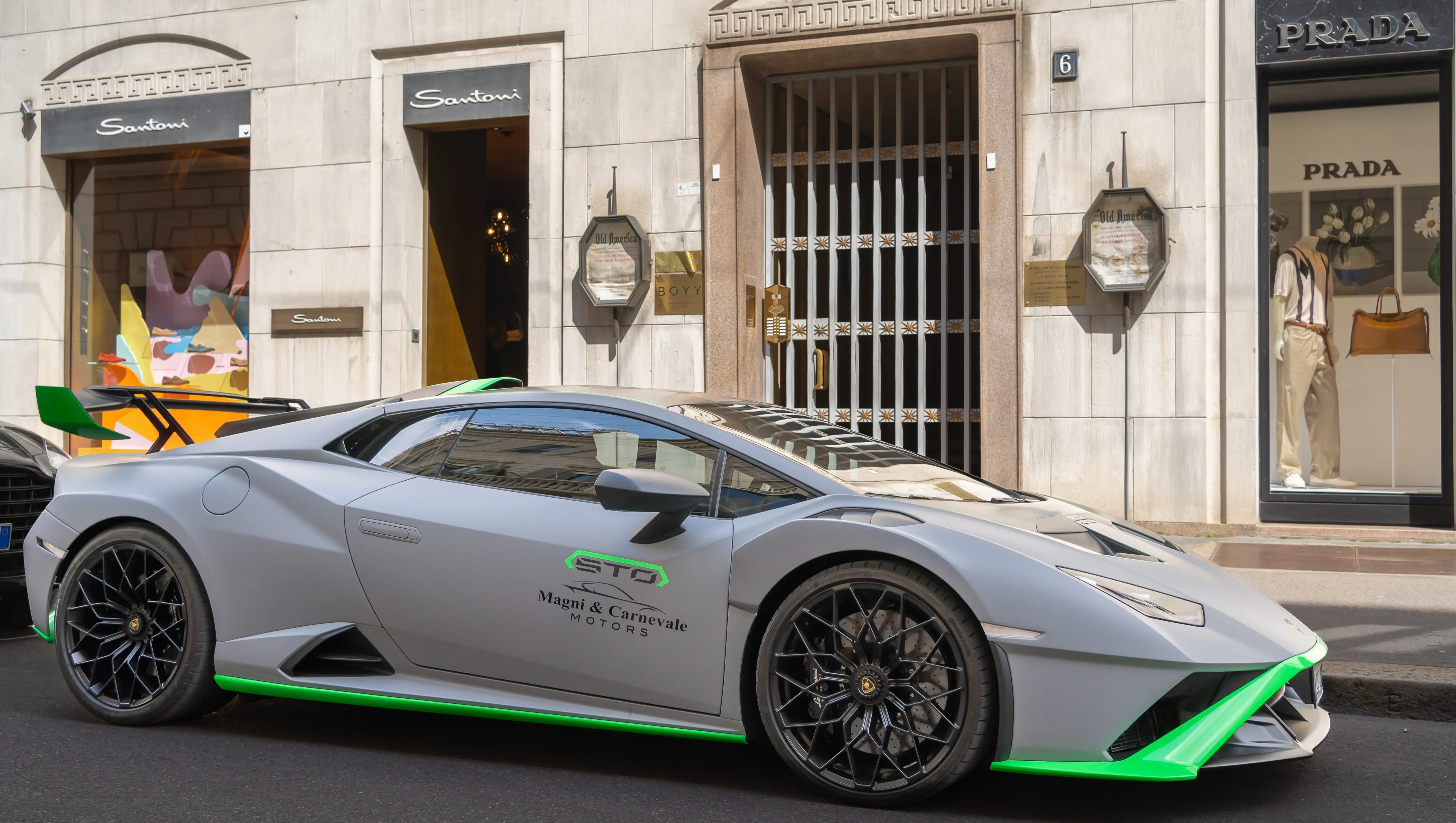 A Lamborghini Huracán parked on Via Montenapoleone in Milan, Italy, reflecting the city’s luxury and design culture