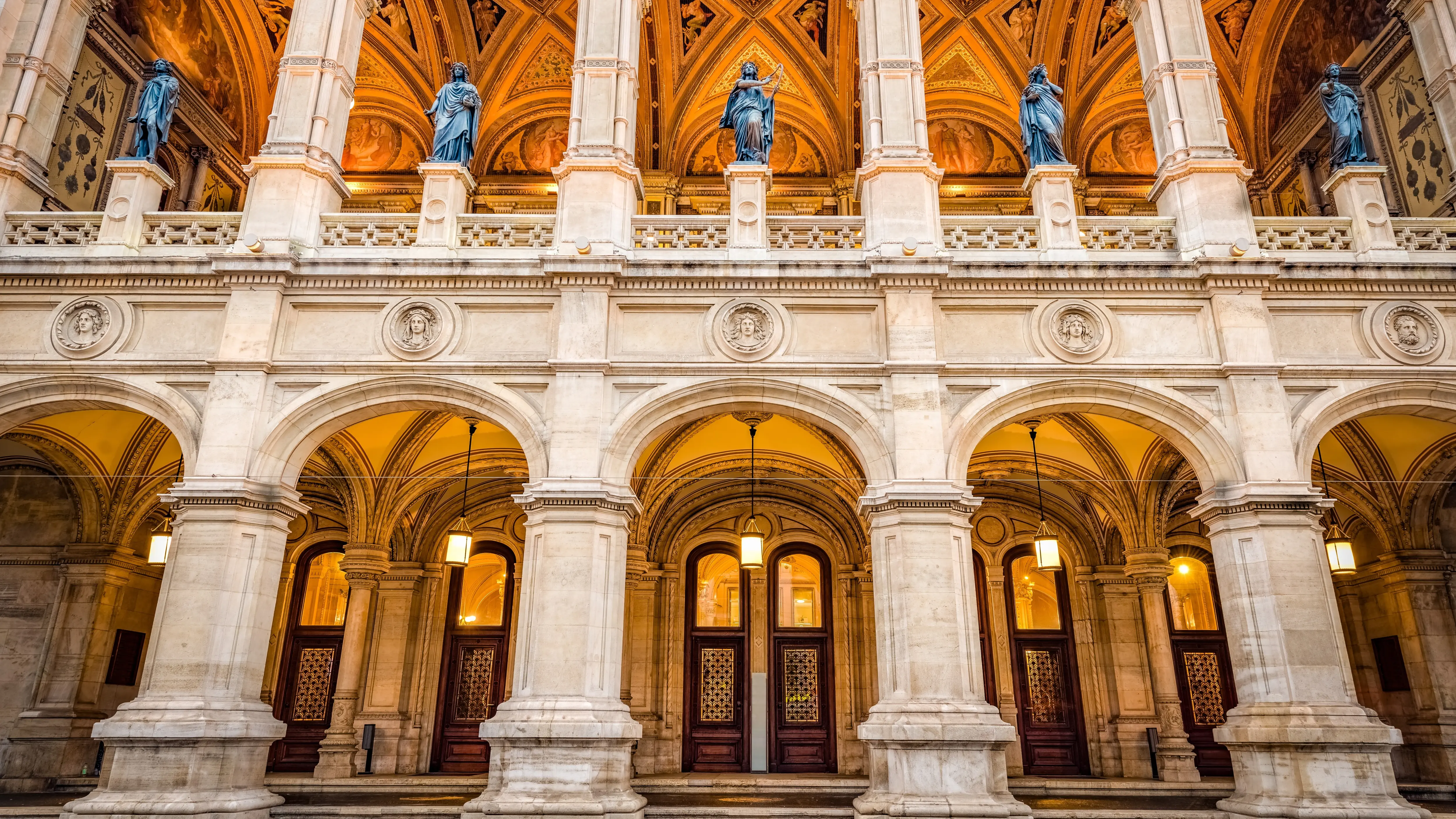 The entrance of the Vienna State Opera on the Ringstrasse in Vienna, Austria, framed by arches and sculptural details