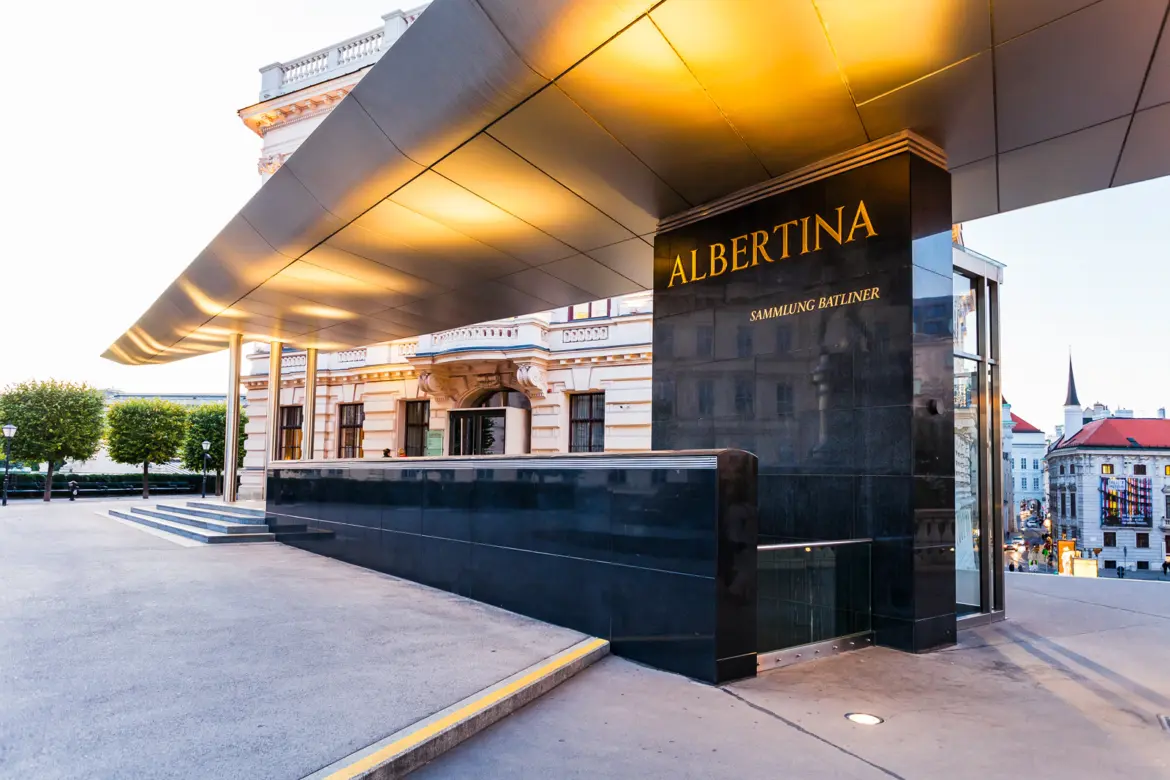 Entrance of the Albertina Museum at the top of Albertinaplatz in Vienna marking the transition into its historic interiors
