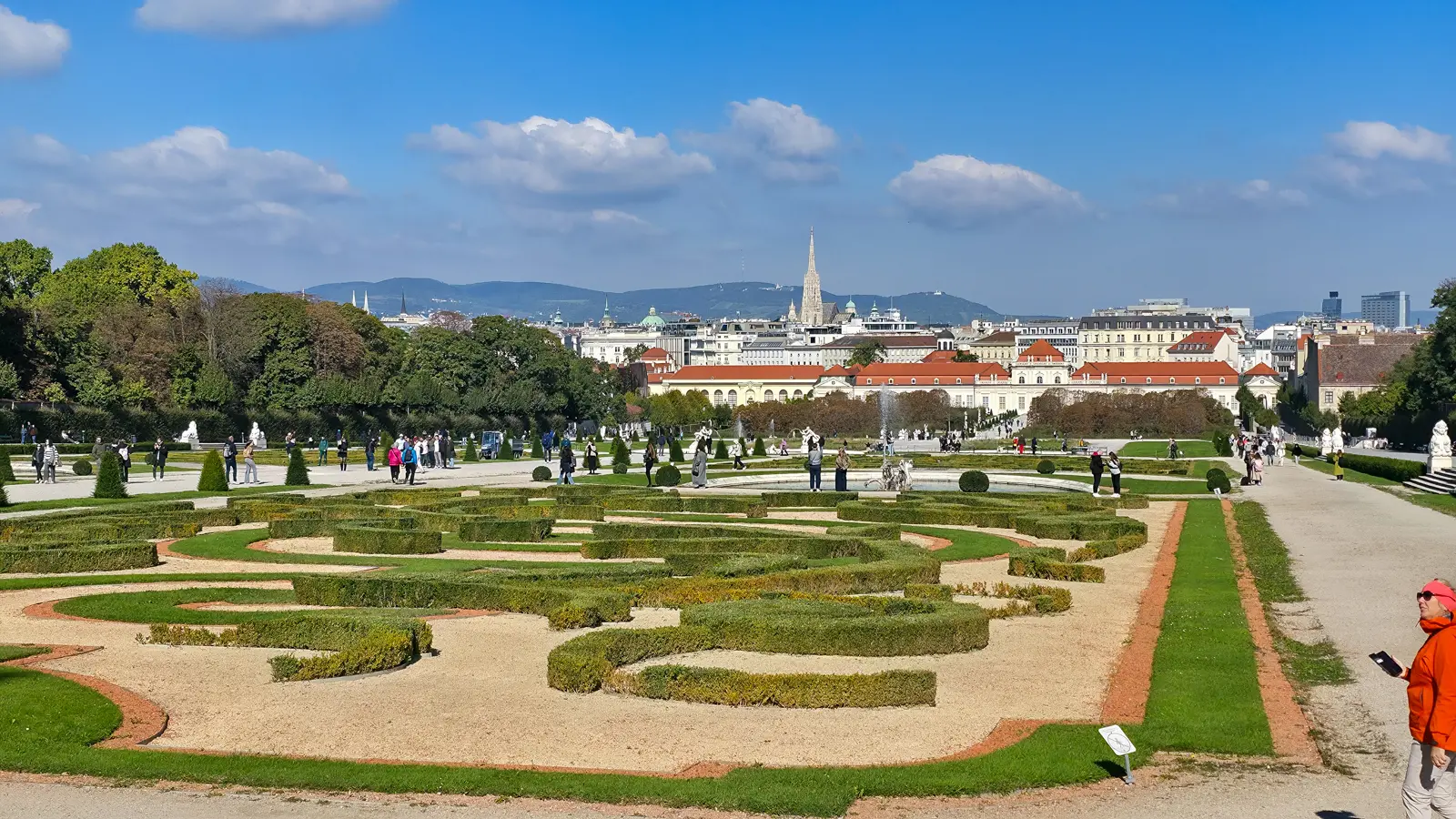 The formal French-style gardens of the Belvedere in Vienna with sculpted hedges and fountains connecting the two palaces