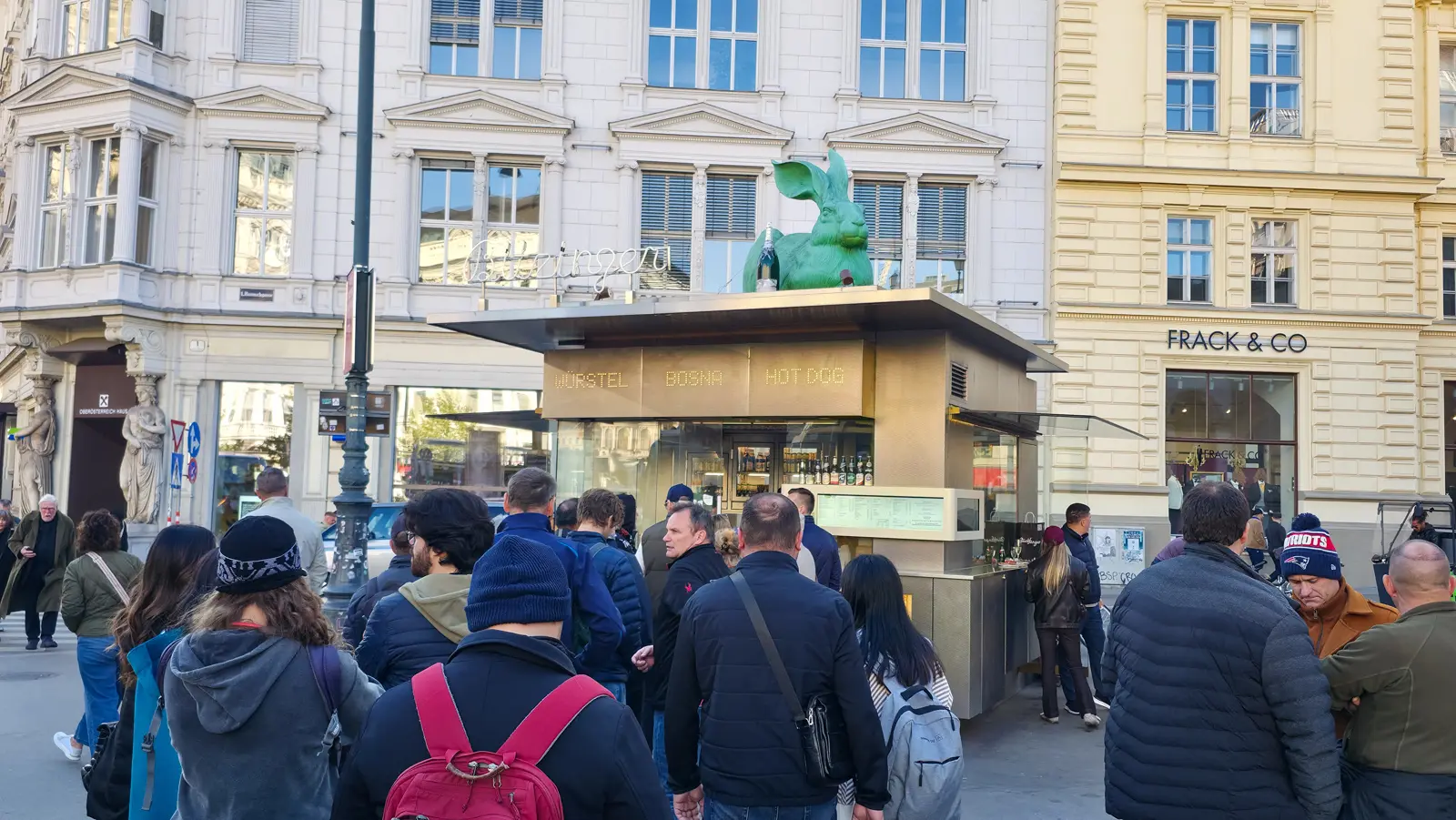 The steady evening line at Bitzinger Würstelstand near the Albertina in Vienna