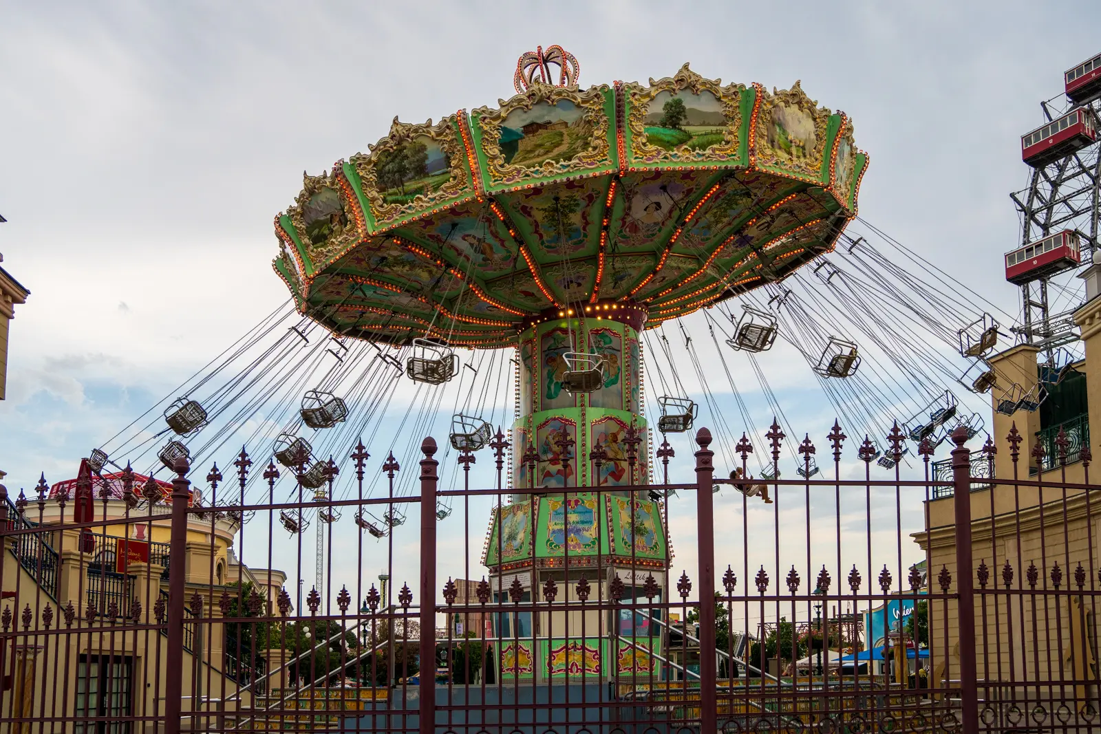 Colorful chair swing ride at Vienna’s Wurstelprater capturing the lively and nostalgic atmosphere of the historic amusement park
