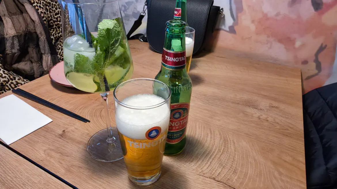 Tsing Tao beer and the Chinacy Spritz cocktail at Chinacy restaurant in Vienna, served as pre-dinner drinks