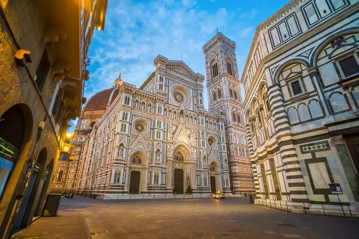 Piazza del Duomo in Florence featuring the ornate façade of Santa Maria del Fiore, Giotto’s Bell Tower, and the historic Baptistery