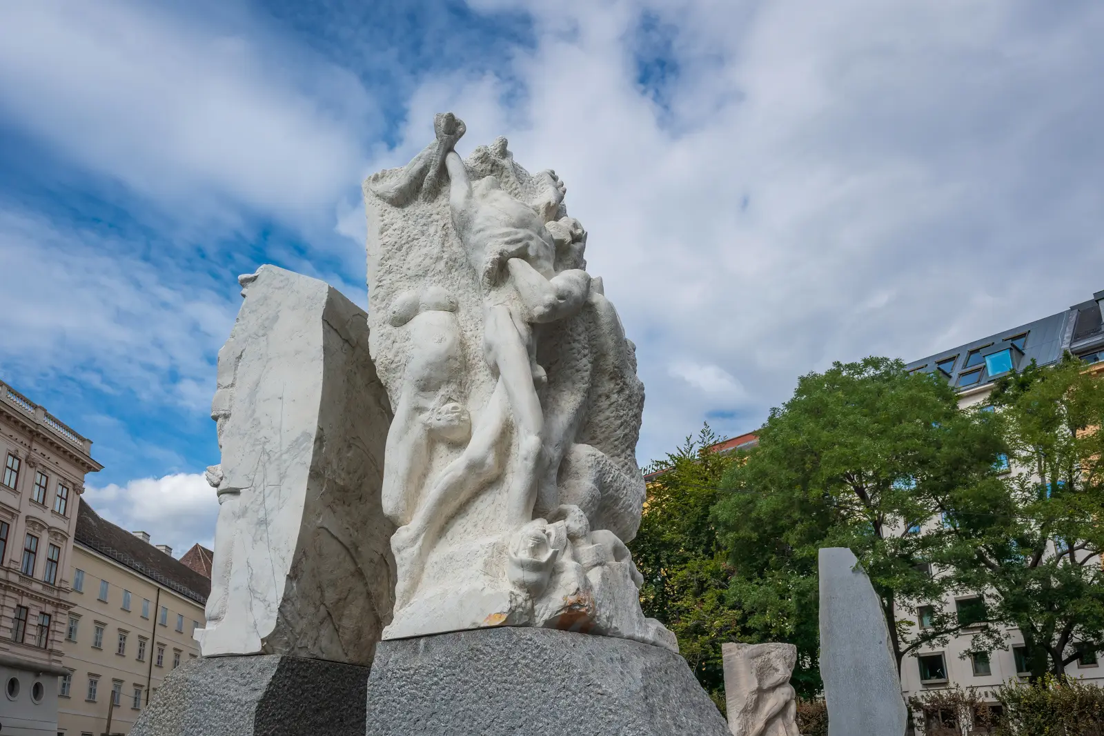 Close-up of the Gate of Violence at the Memorial Against War and Fascism in Vienna, showing sculptural details