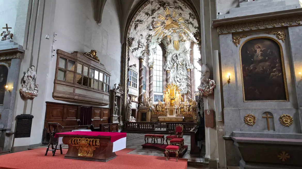 The High Altar of St. Michael’s Church in Vienna featuring the dramatic Fall of the Angels sculptural group and the revered Maria Candia icon
