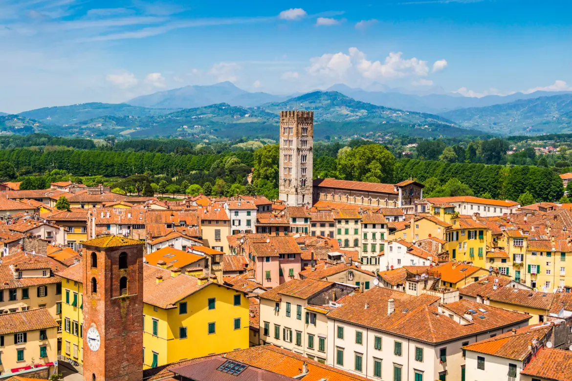 Panoramic view over Lucca’s terracotta rooftops, showcasing the peaceful atmosphere and historic character of this elegant walled Tuscan city